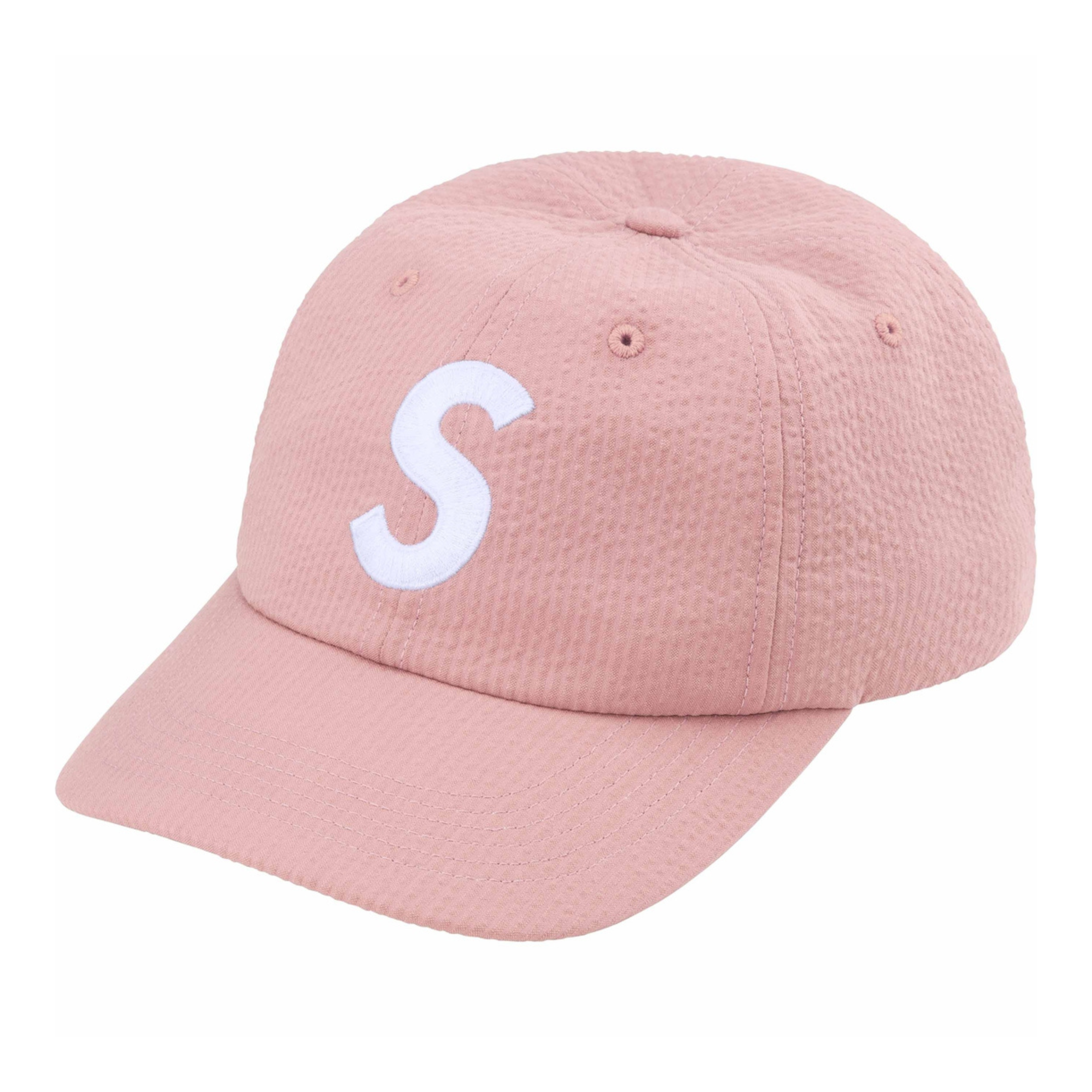 Supreme Seersucker S Logo 6-Panel Cap in pink, featuring white embroidered S on front, Supreme logo on back, and black adjustable strap.