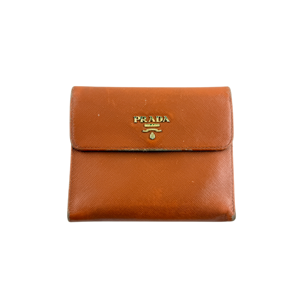 Prada Saffiano Leather Trifold Wallet in brown leather with gold-tone logo, showcasing its structured flap and crosshatch texture.