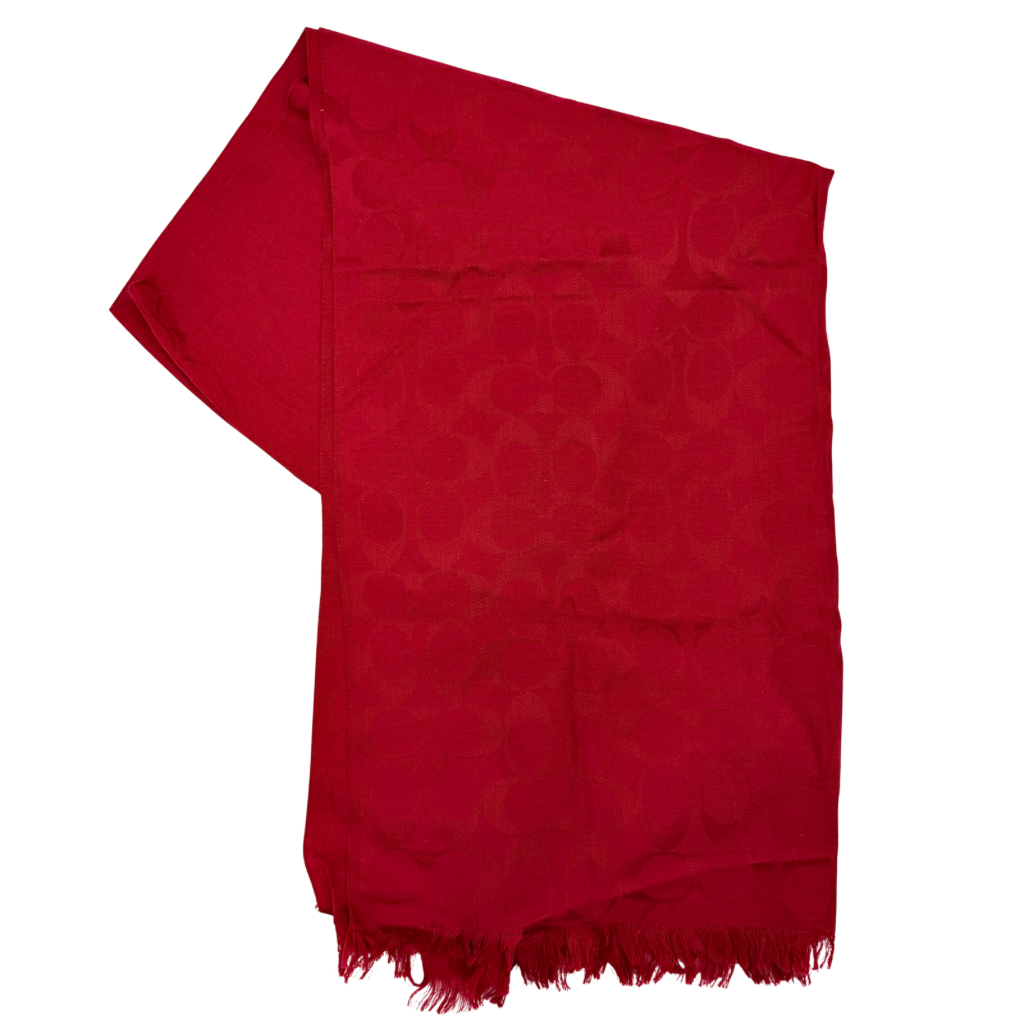 Coach Signature Monogram Wool Scarf in vibrant red wool and silk with tonal logo pattern and delicate fringe edging.