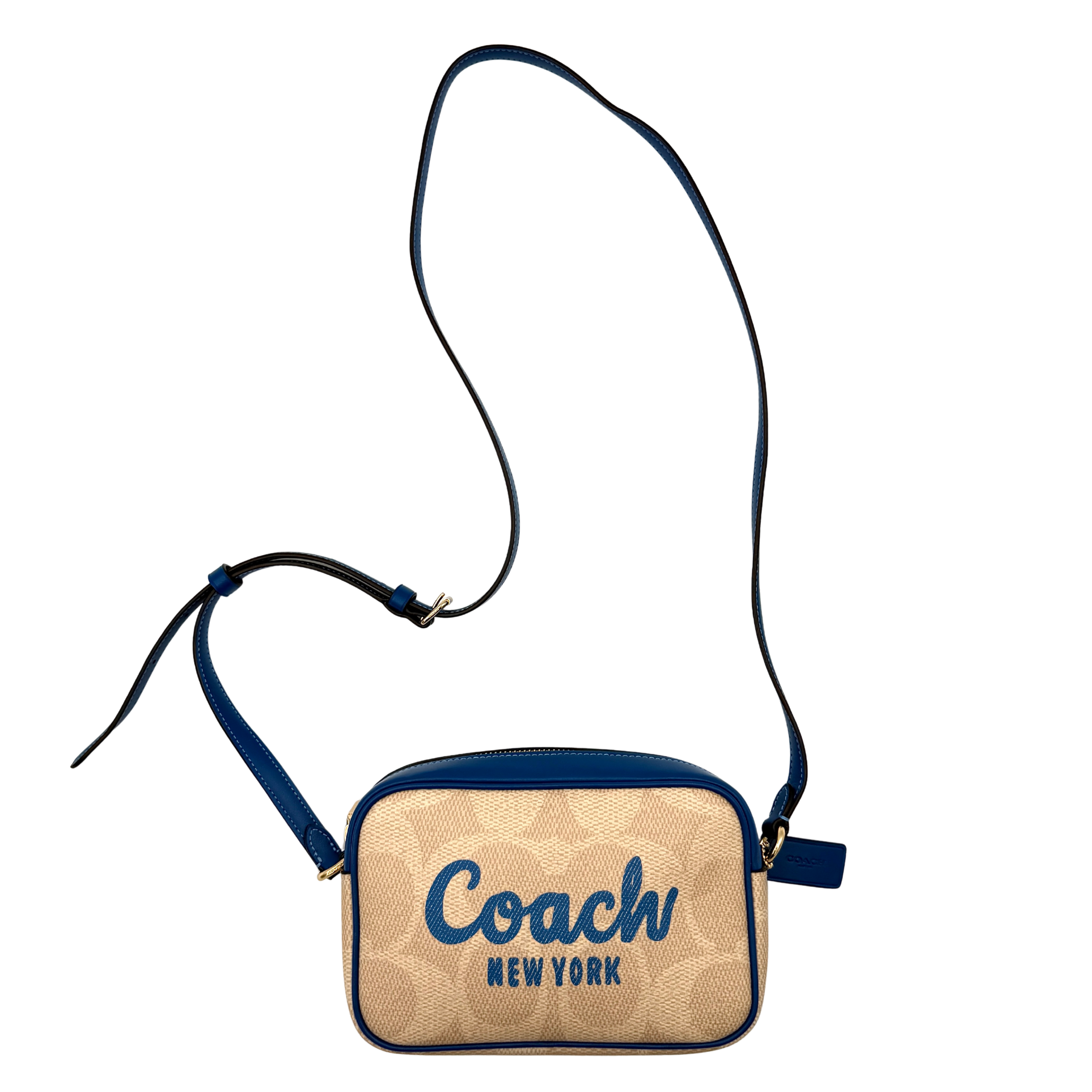 Coach Signature Jamie Camera Crossbody Bag in beige canvas with bold blue logo, cobalt trim, and adjustable blue leather strap.