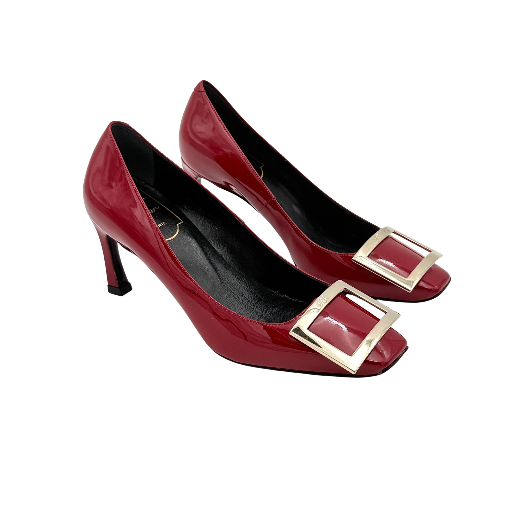 Pair of Roger Vivier Belle Vivier Trompette patent pumps in glossy red with gold-tone buckles, exuding a polished finish.