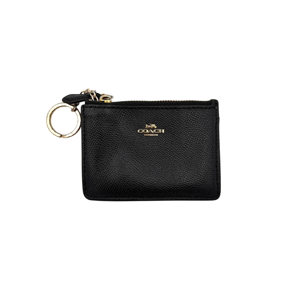 Coach Mini Skinny ID Case Cardholder in black leather with gold-tone hardware, featuring a zip closure and signature logo detailing.