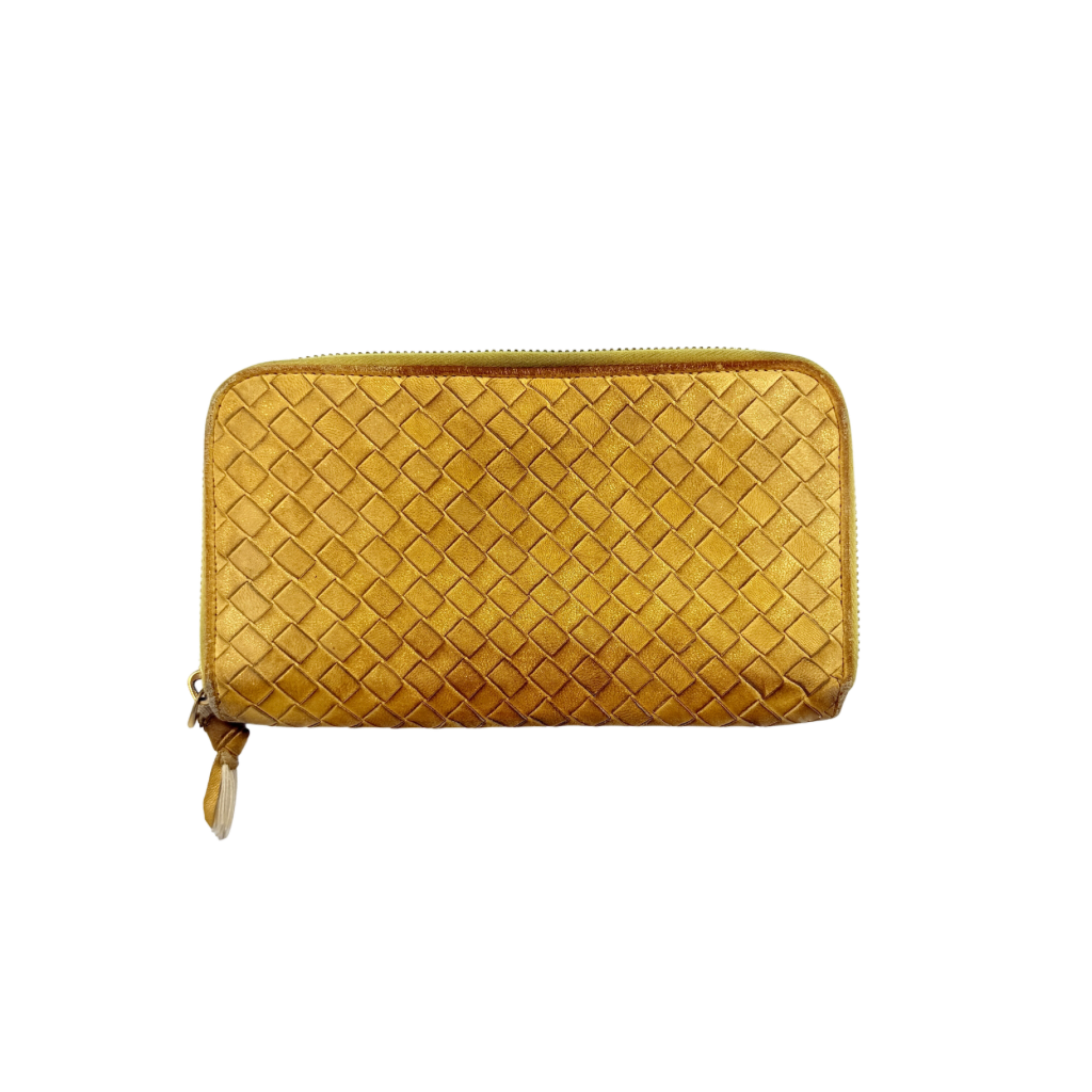 Bottega Veneta yellow Intrecciato woven leather long wallet with gold zip-around closure and signature leather pull.
