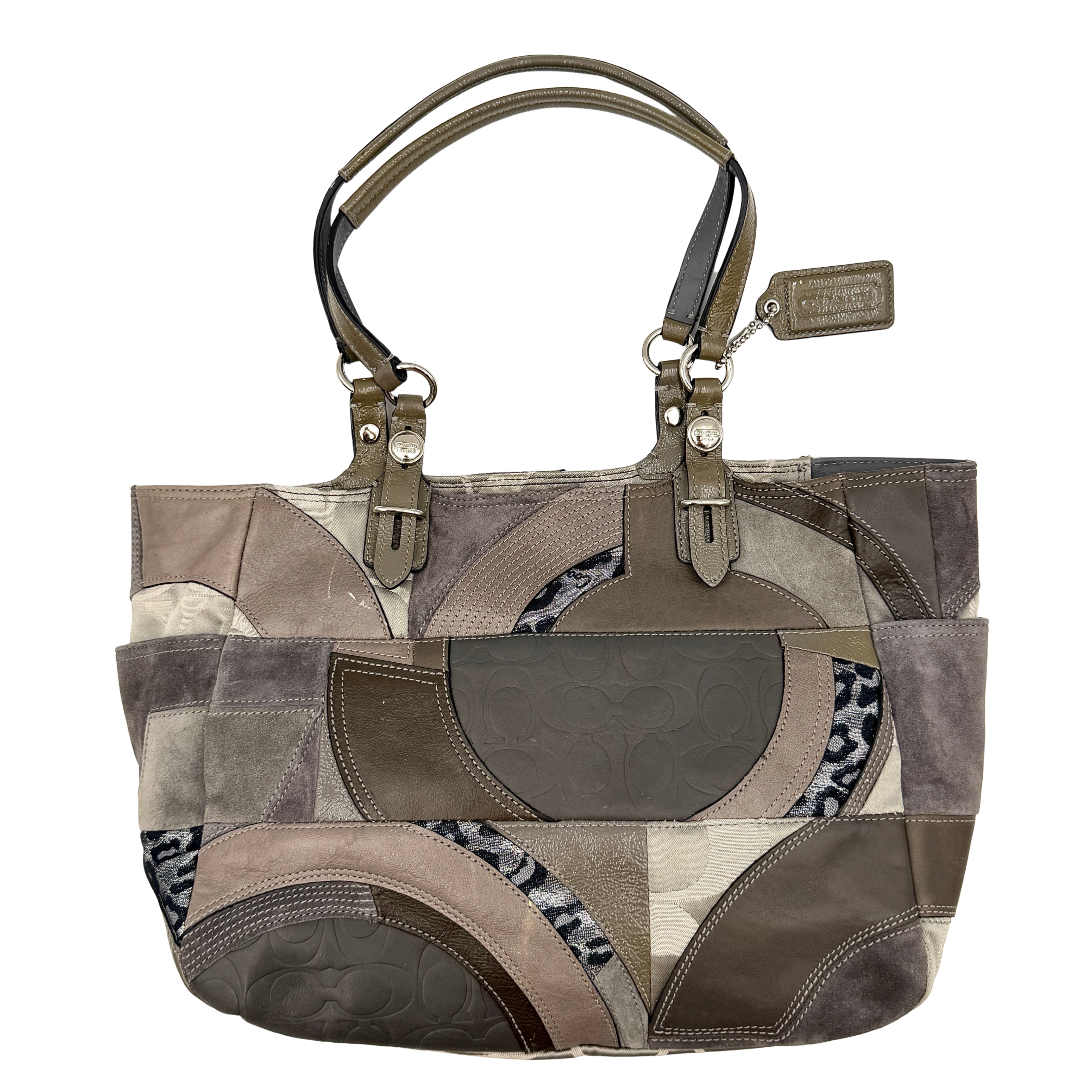 Coach Y2K patchwork tote in grey tones with jacquard, suede, and ocelot-print panels, shown with double handles and signature tag.