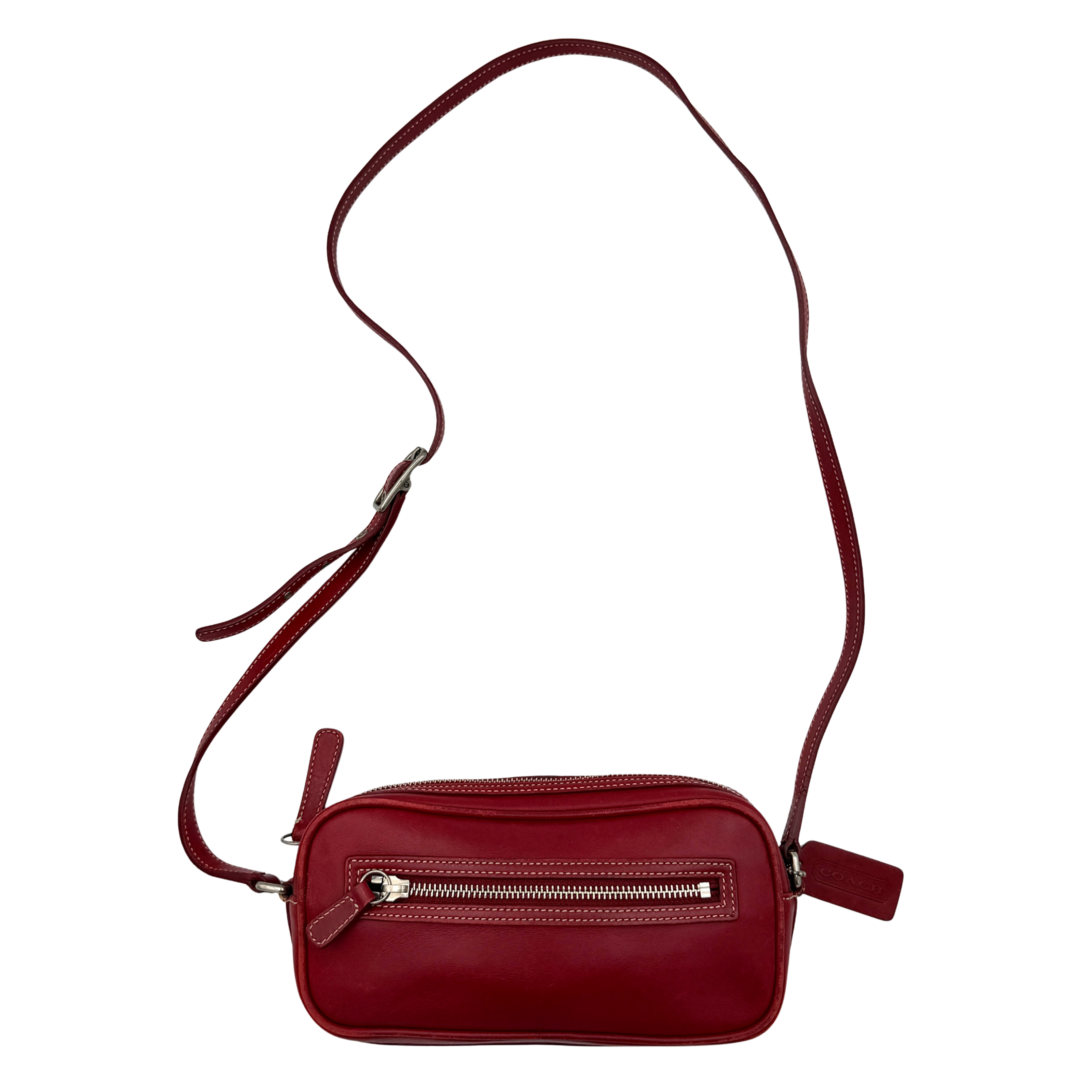 Burgundy Coach Legacy West Crossbody Camera Bag with contrast stitching, exterior zip pocket, and slender adjustable strap.