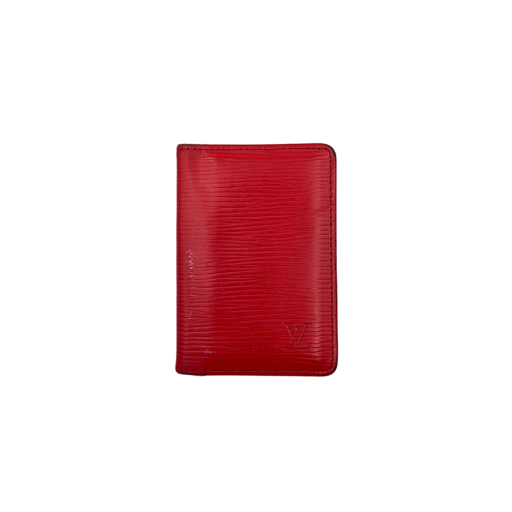 Front-facing view of the Louis Vuitton Epi Leather Pocket Organizer in a striking red, featuring subtle LV embossing and an elegant textured finish.