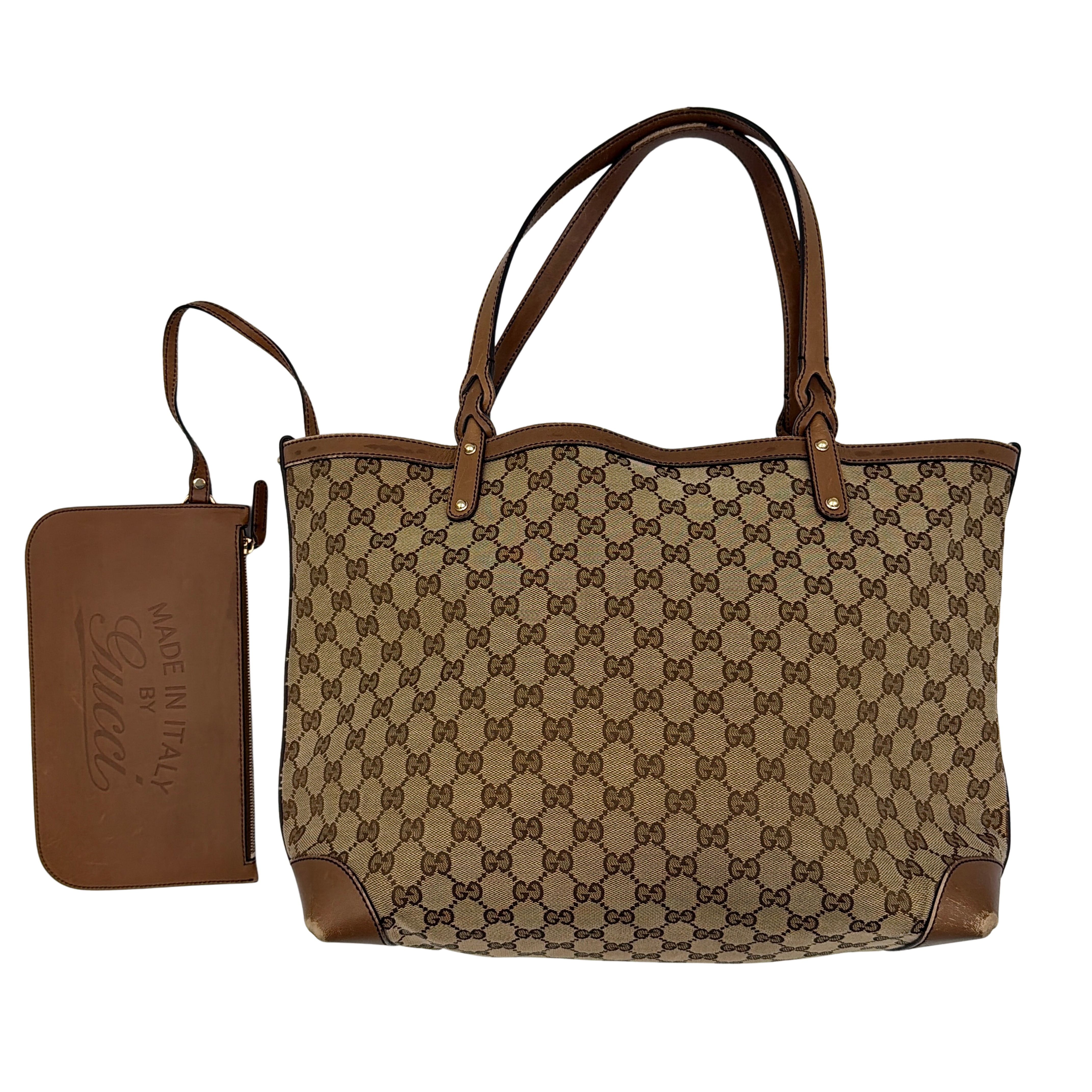 Gucci GG Monogram Craft Shoulder Bag in beige and brown canvas with double leather straps and matching logo-embossed leather pouch.
