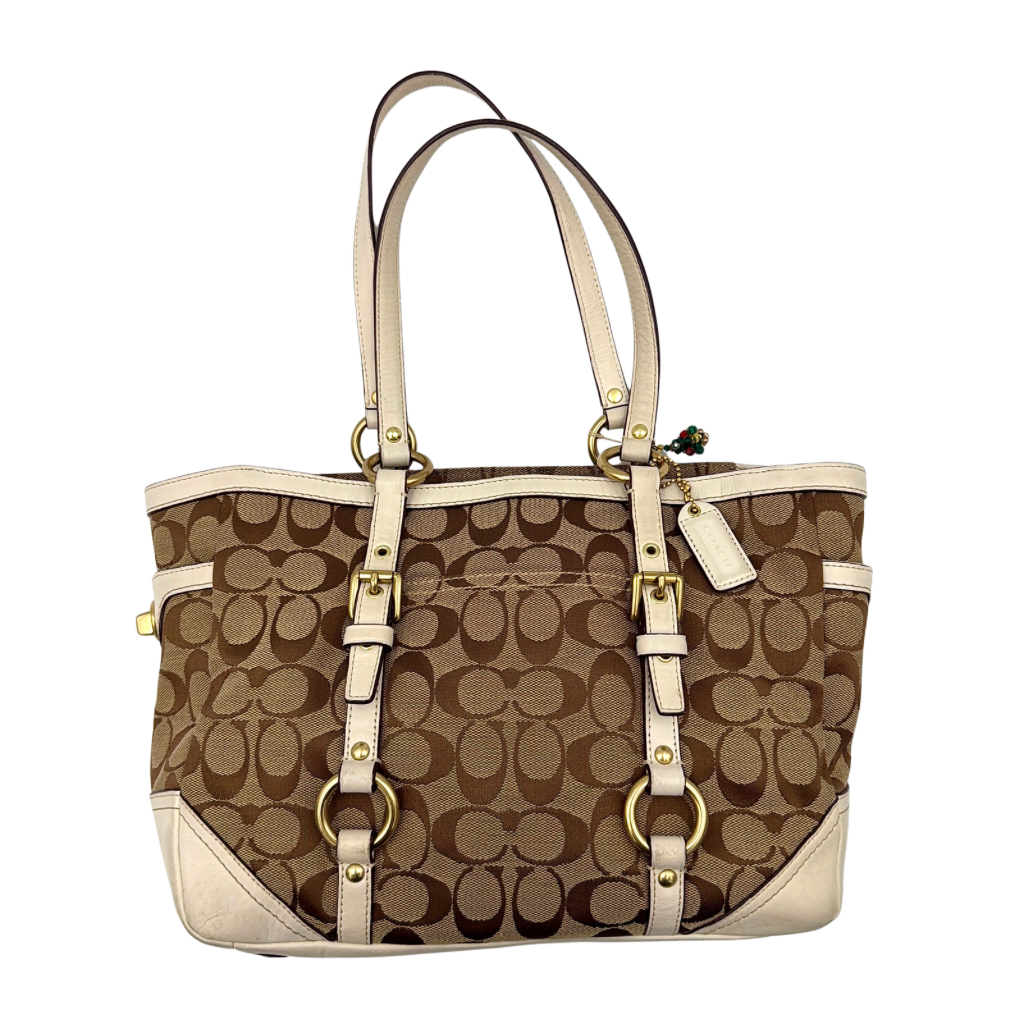 Coach Signature Gallery Tote Bag in beige jacquard canvas with cream leather trim, belted accents, and gold-tone hardware.
