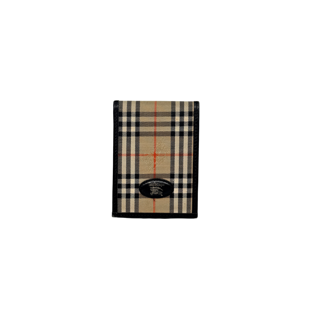 Front-facing view of a Burberry Nova Check cardholder in beige canvas with black leather trim and an oval Burberrys plaque.