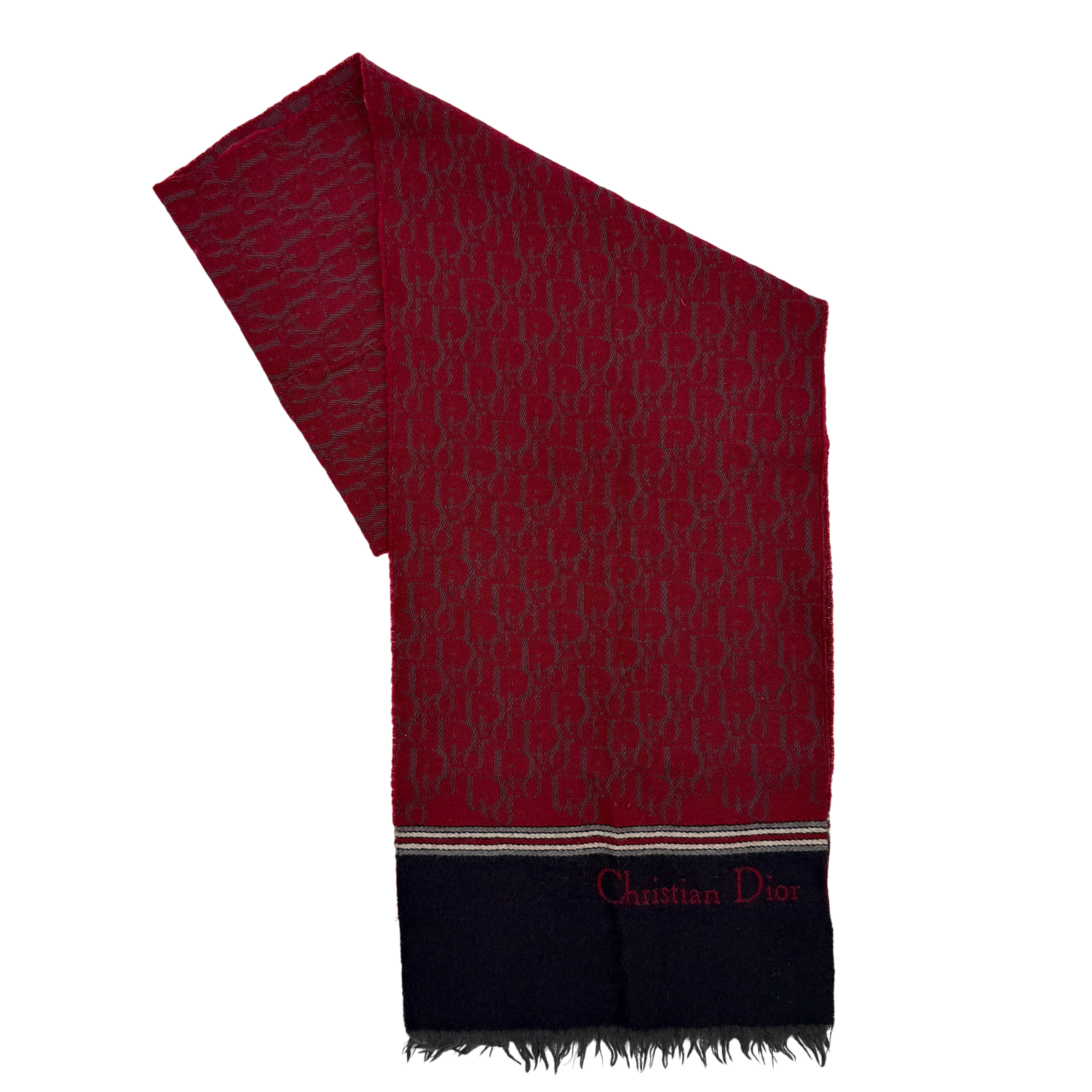 A red Dior Oblique Trotter wool scarf with all-over monogram pattern, navy border, stripe detail, and fringe trim.