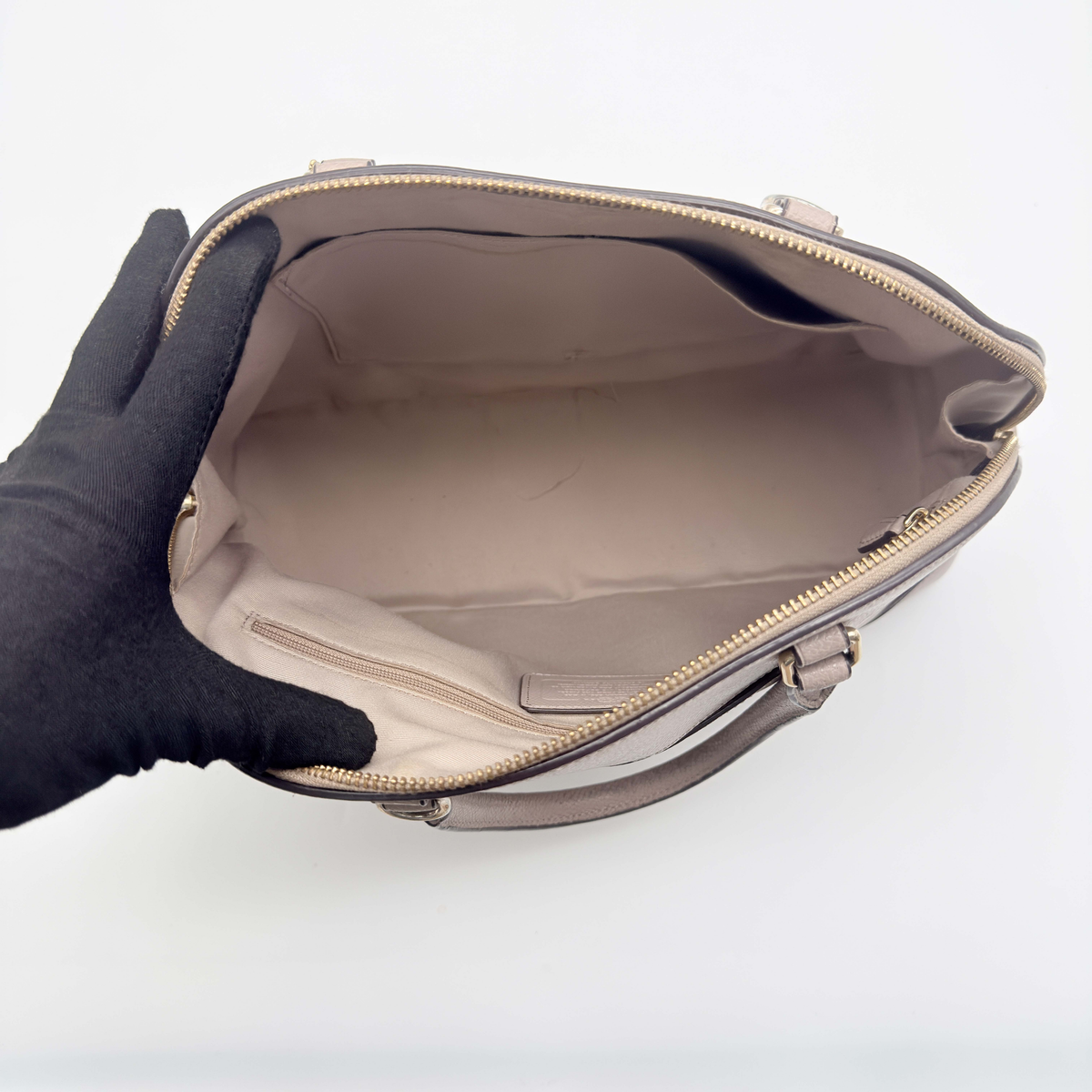 Coach Sierra Satchel in grey taupe with dual handles and detachable strap, shown against a white background.
