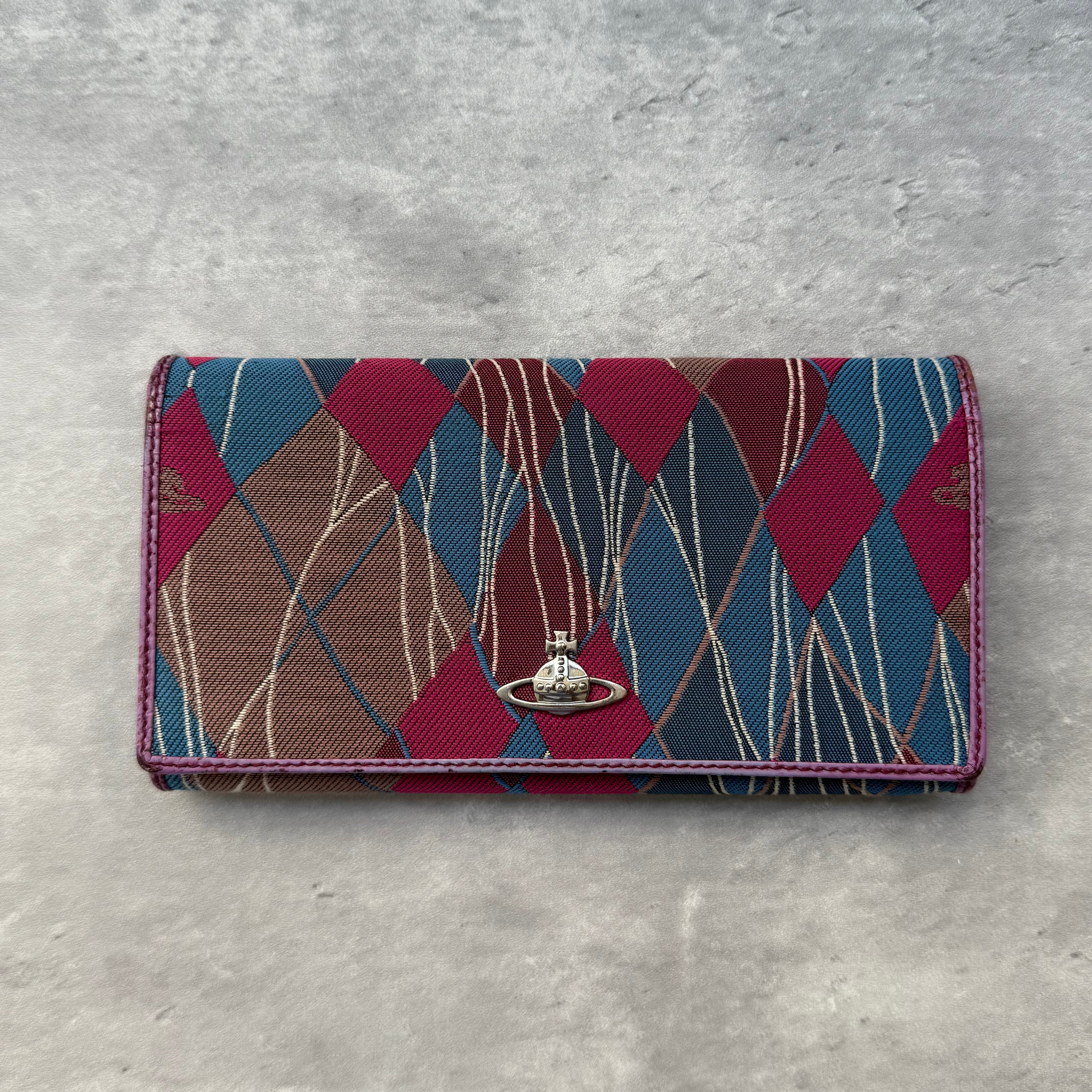Vivienne Westwood Argyle Wallet Multicolor, featuring bold burgundy, blue, and brown argyle canvas with silver-tone Orb emblem and spacious leather interior.