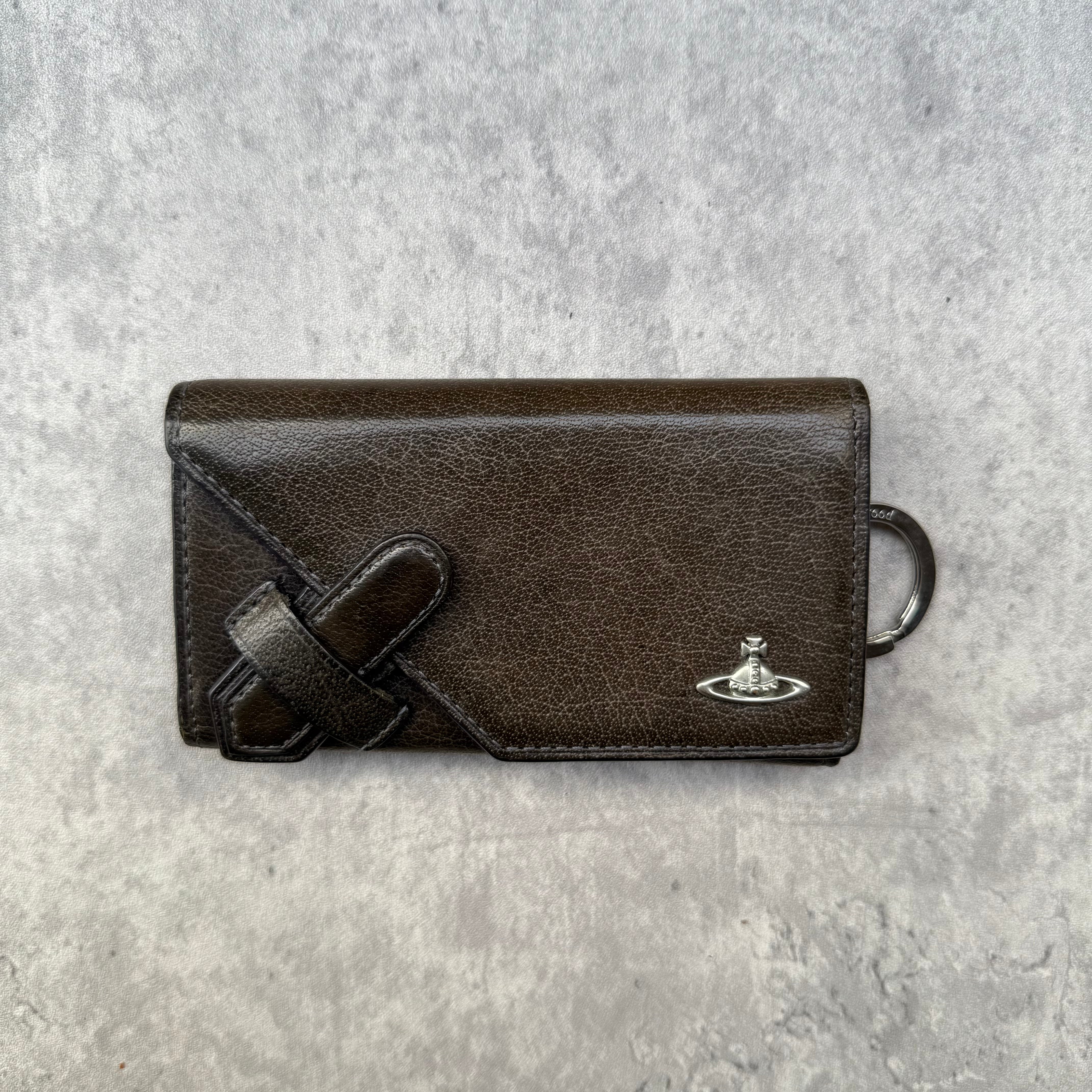Vivienne Westwood Grey Leather Key Holder with Orb logo, loop-through tab closure, and interior key hooks