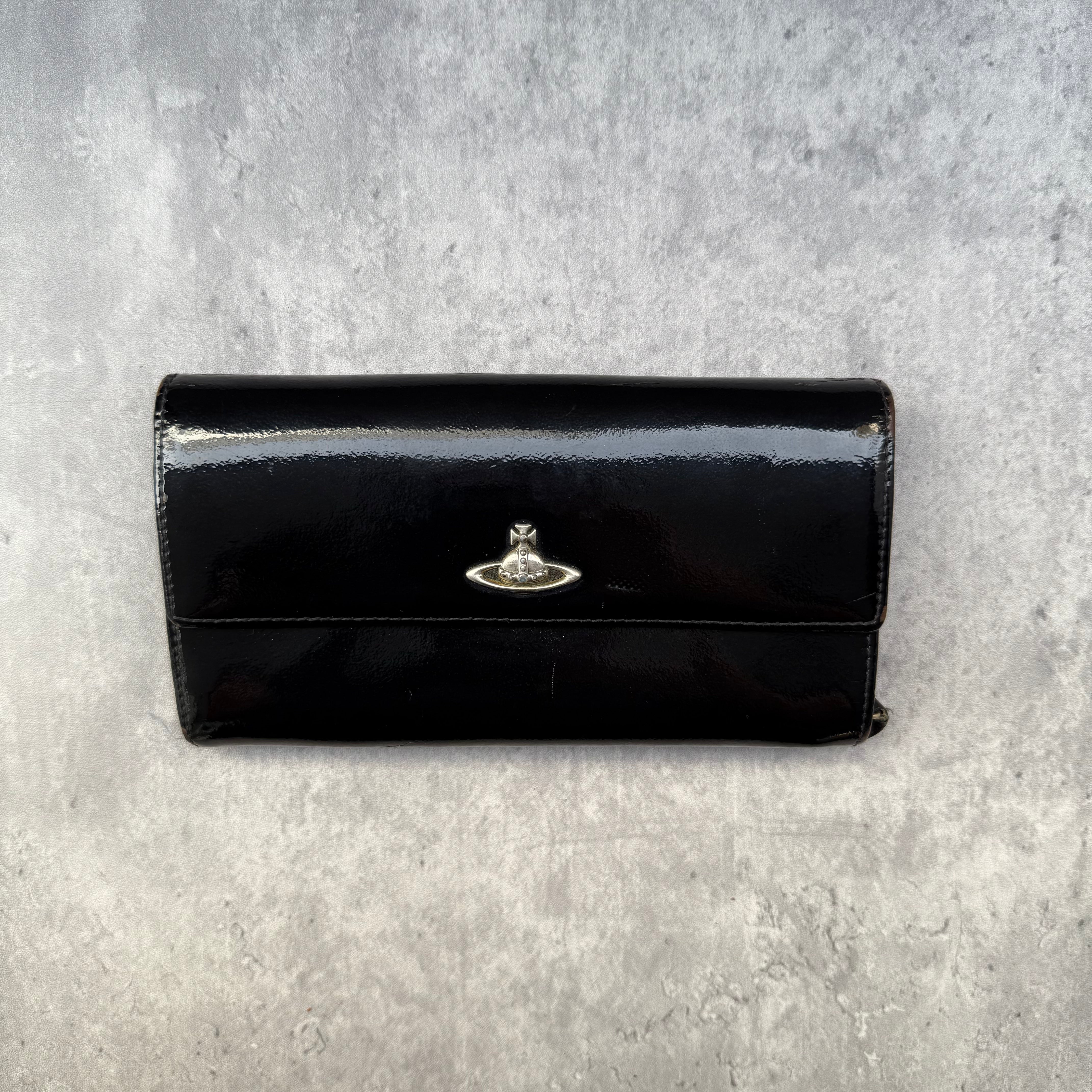 Vivienne Westwood black patent leather wallet with silver orb logo and tartan interior lining