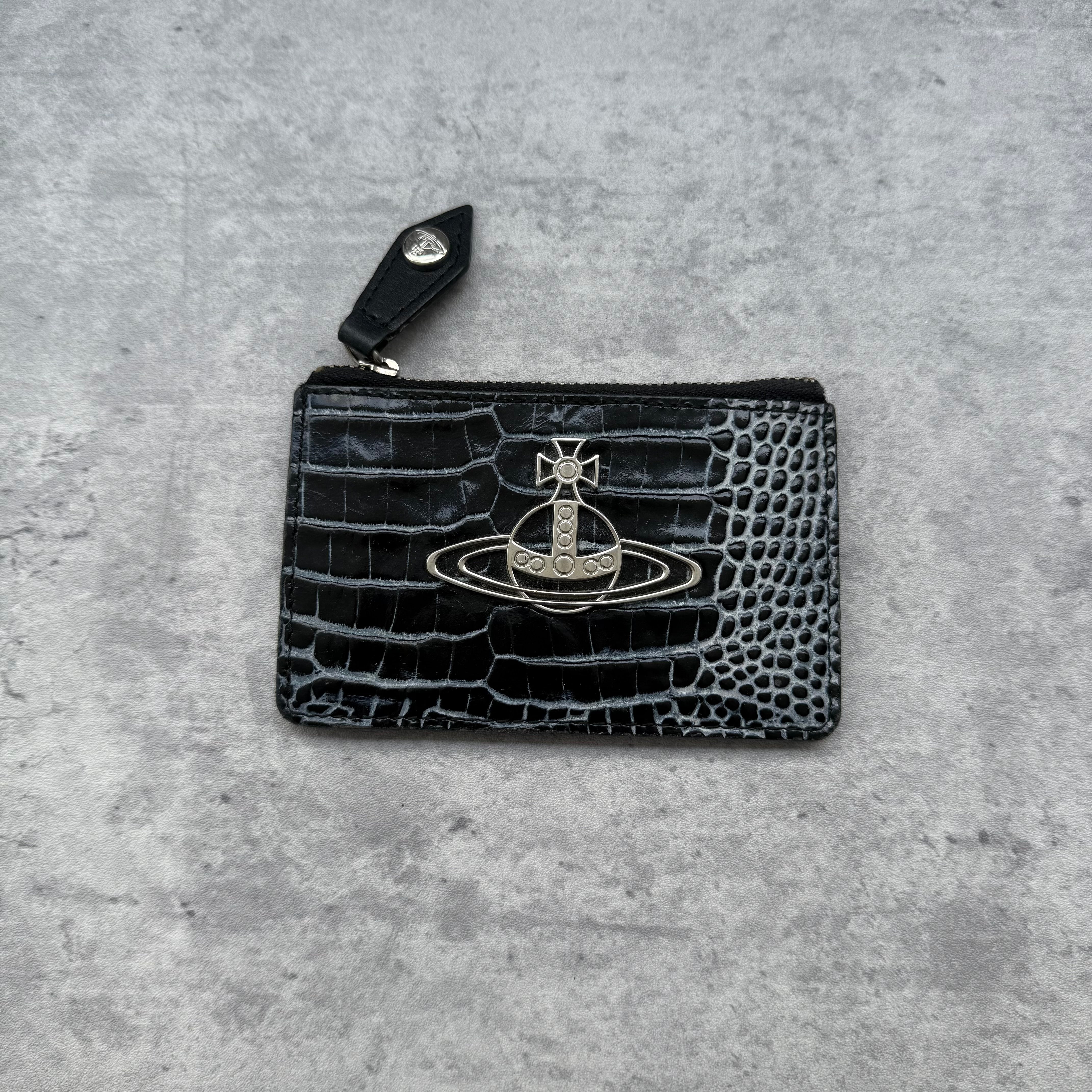 Vivienne Westwood Signature Orb Croc Cardholder in black croc-embossed leather with silver-tone Orb emblem and top zip closure.