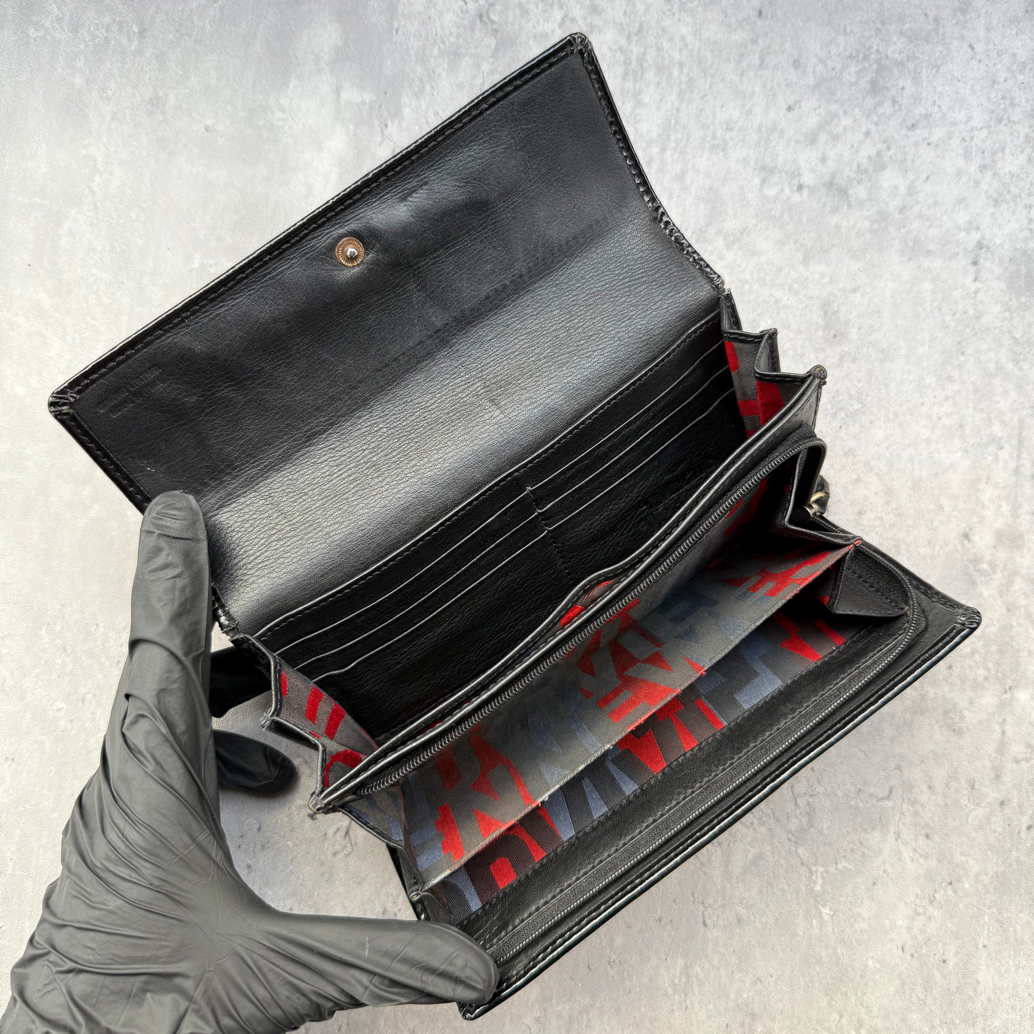 Vivienne Westwood black patent leather wallet with silver orb logo and tartan interior lining