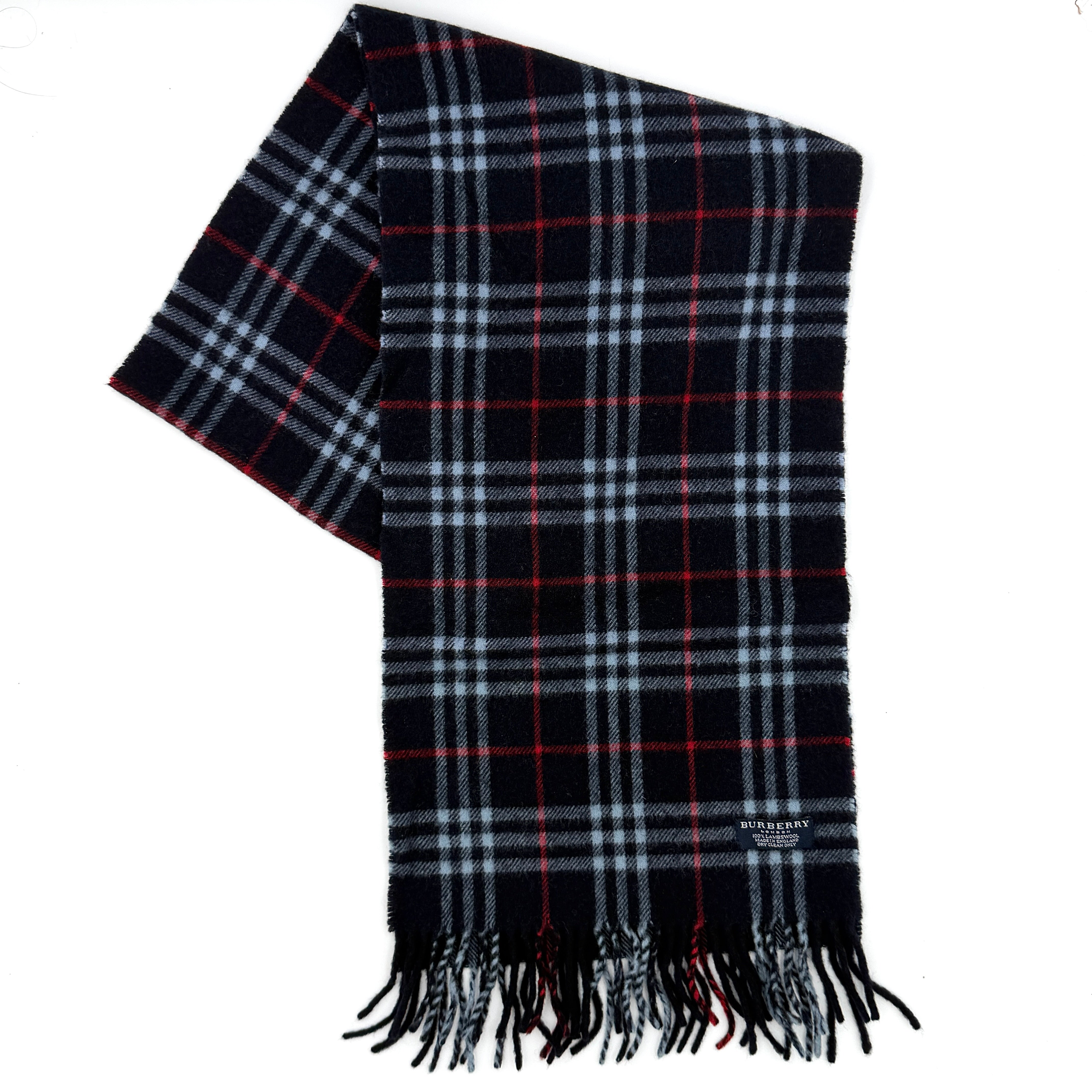 Burberry London scarf with Nova Check pattern in navy, red, and white, featuring fringed ends.