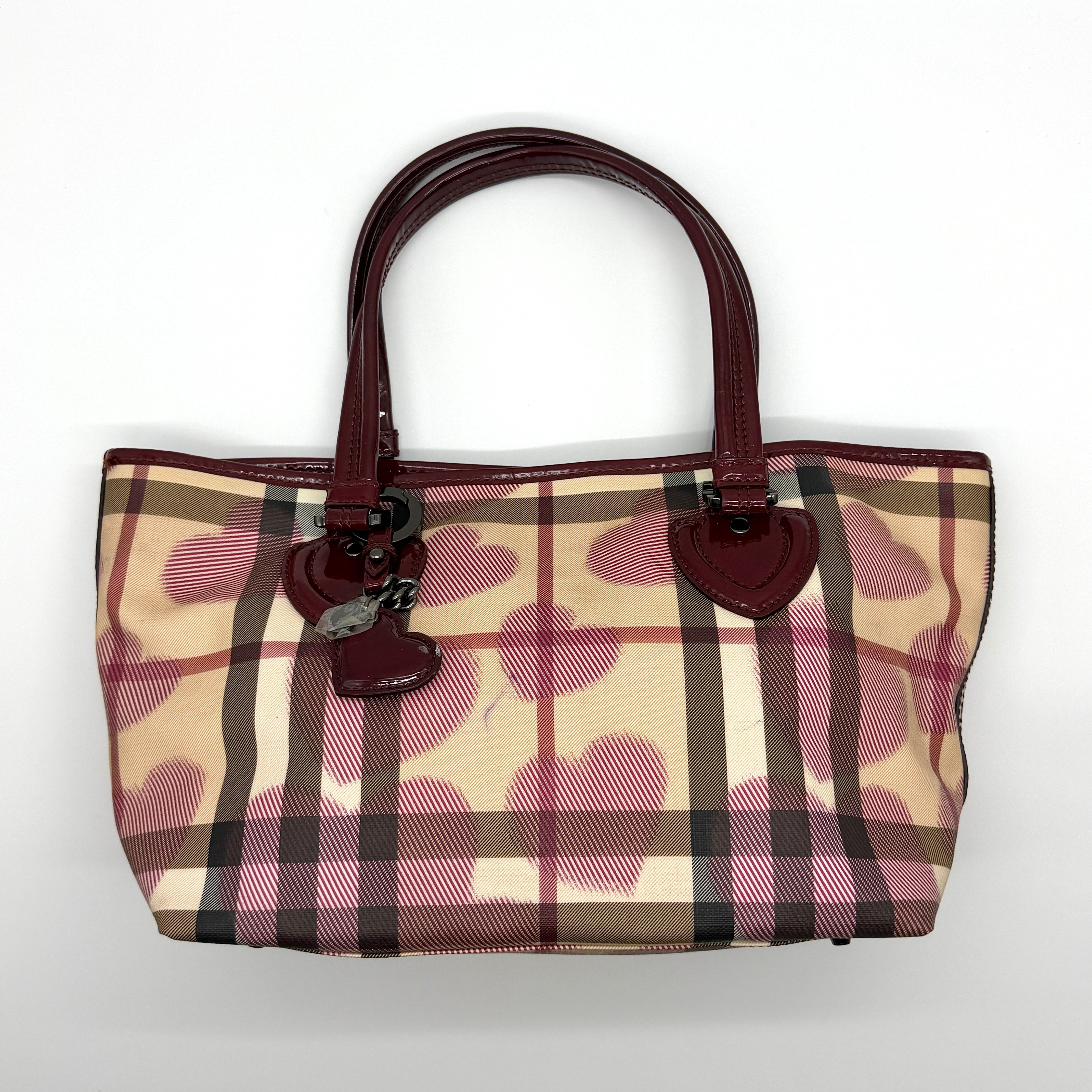 Burberry Nova Check Heart Preloved Luxury Shoulder Bag in beige with pink heart motif and burgundy patent leather trim.