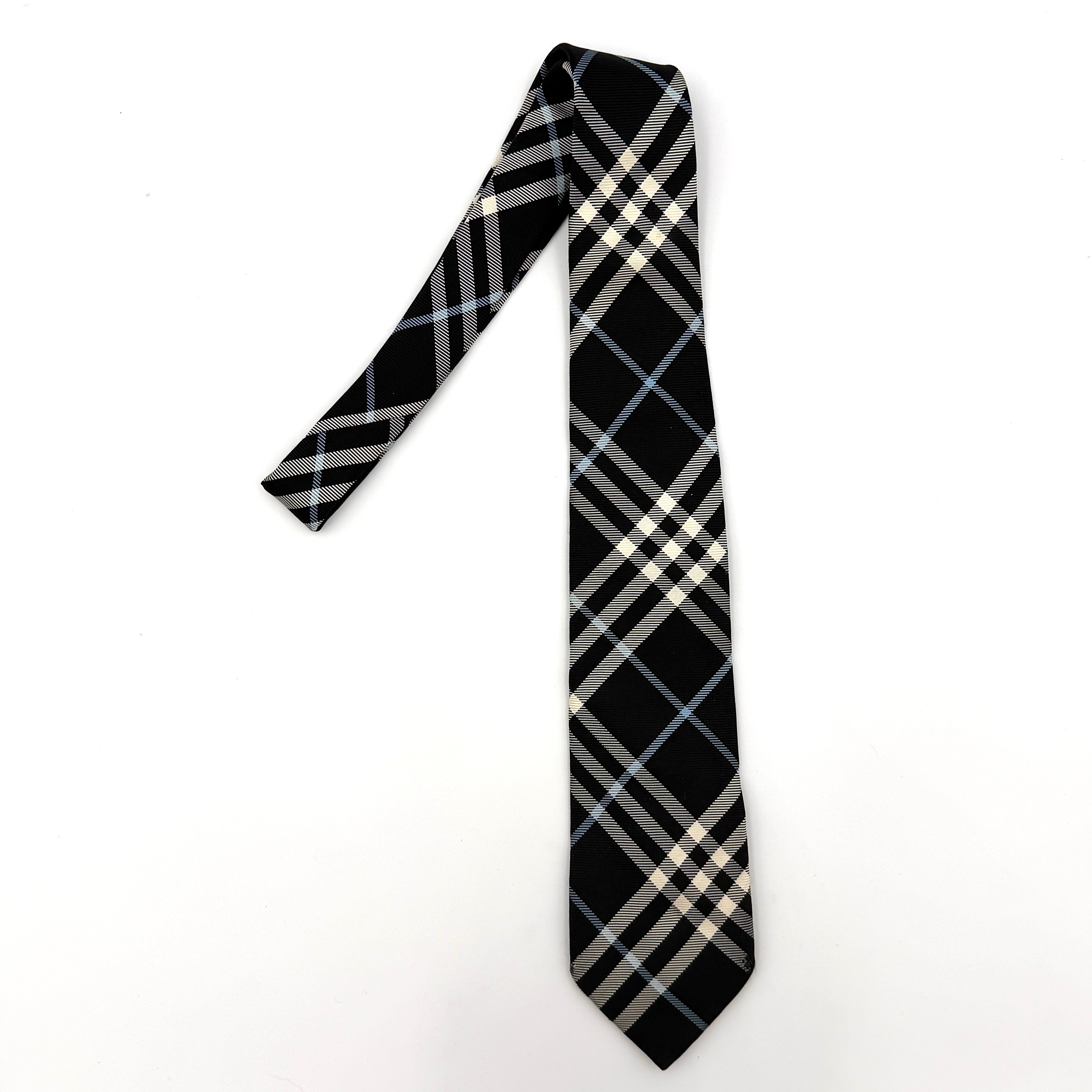 Burberry Nova Check silk tie in black featuring the iconic check pattern and refined woven finish.