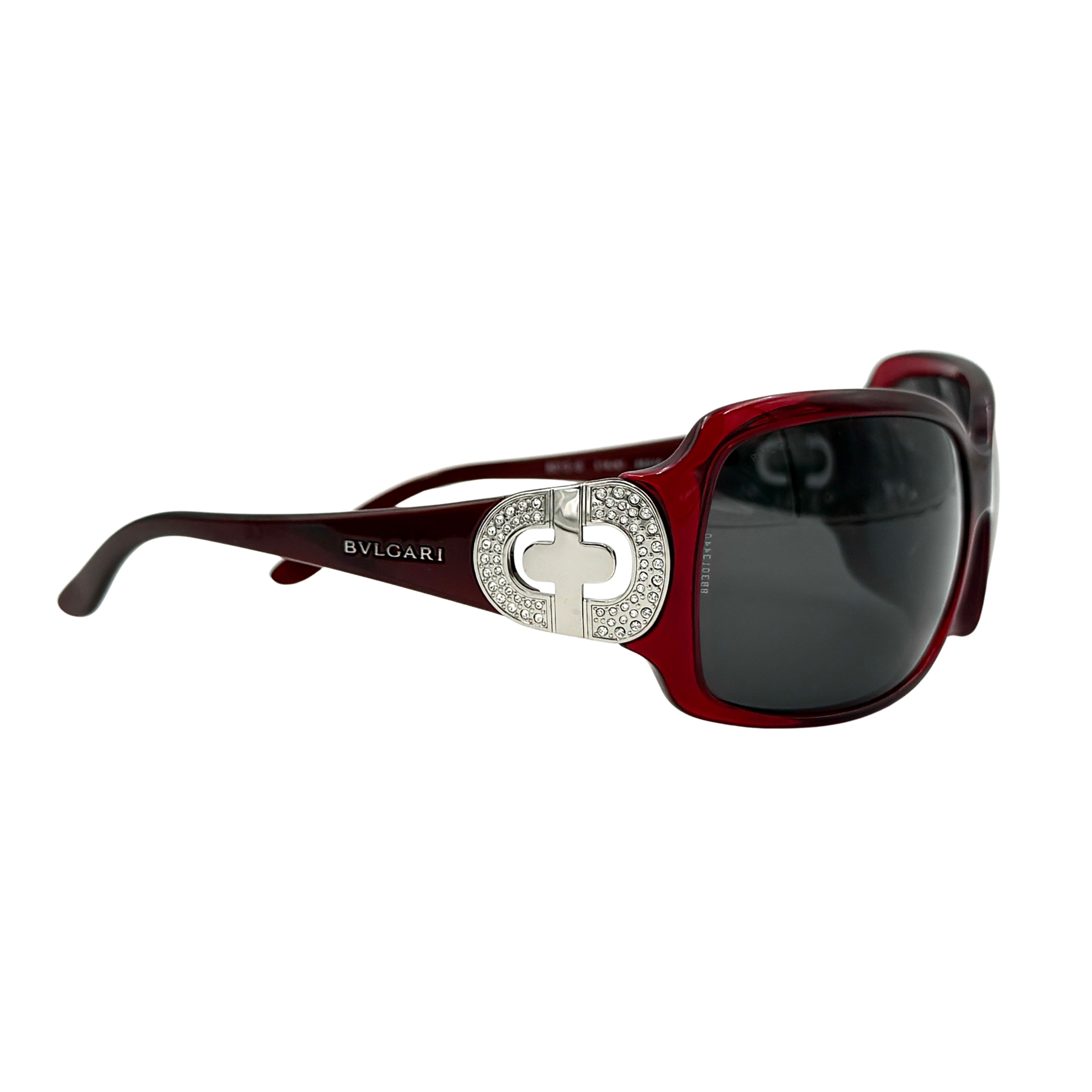 Bvlgari 8013-B sunglasses in maroon with dark lenses and signature silver side hardware, shown with front, side, and case included.