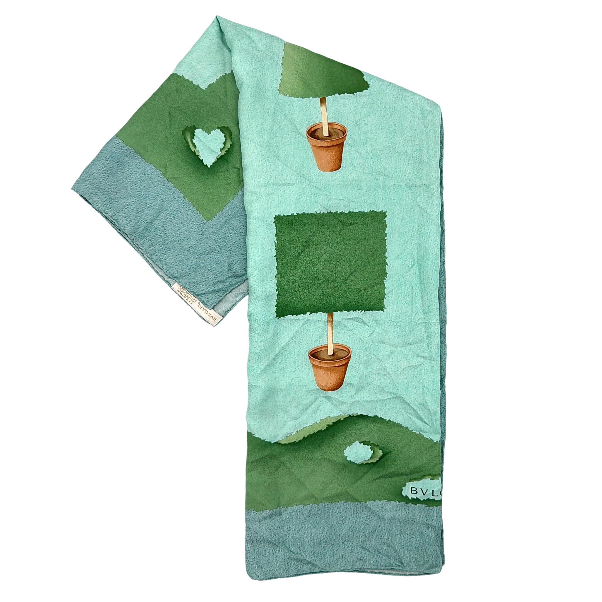 Bvlgari by Davide Pizzigoni silk scarf in green garden graphic print, shown unfolded and styled in multiple folds with label detail.