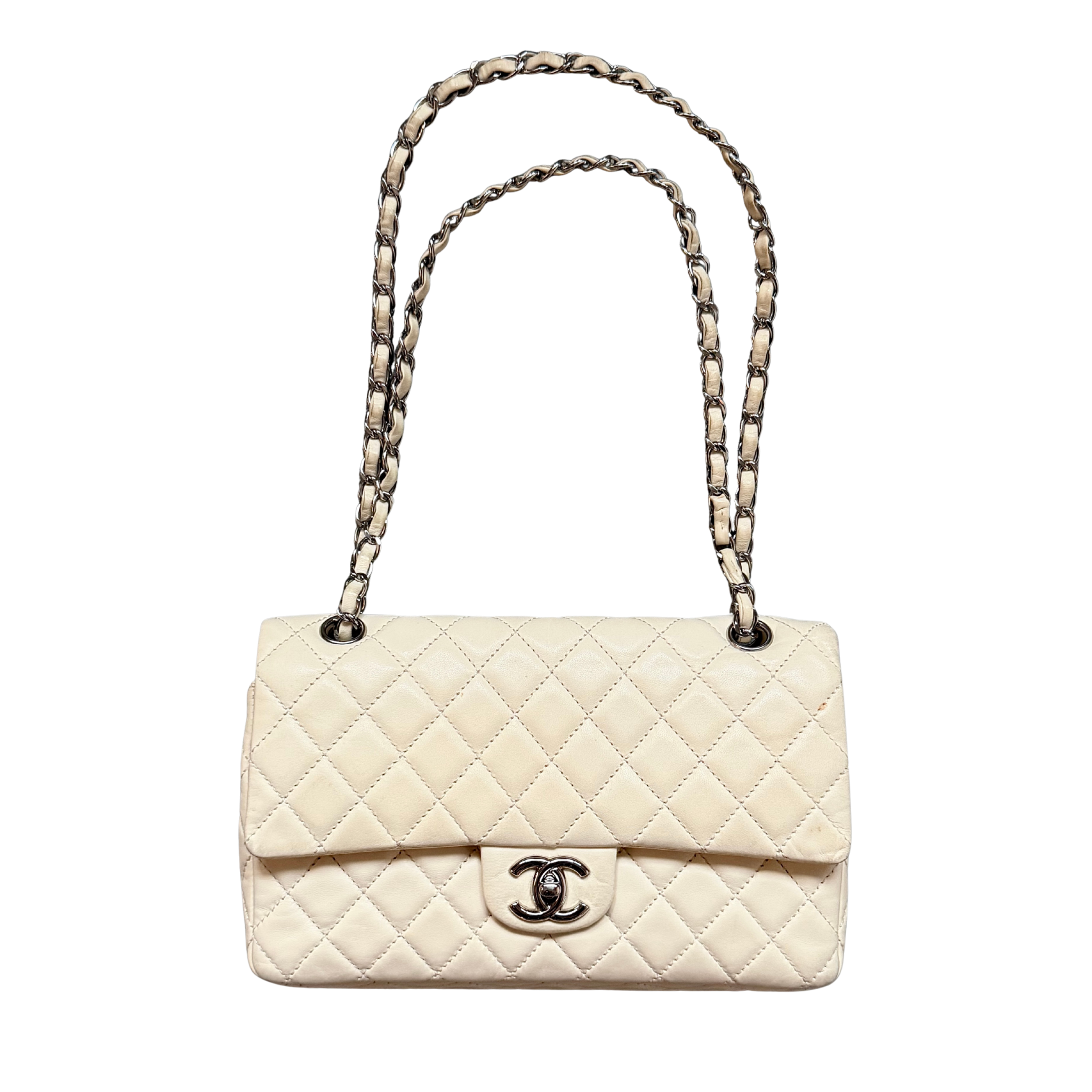 Chanel off-white matelasse quilted double flap shoulder bag with signature interlocking CC turn-lock and chain strap.