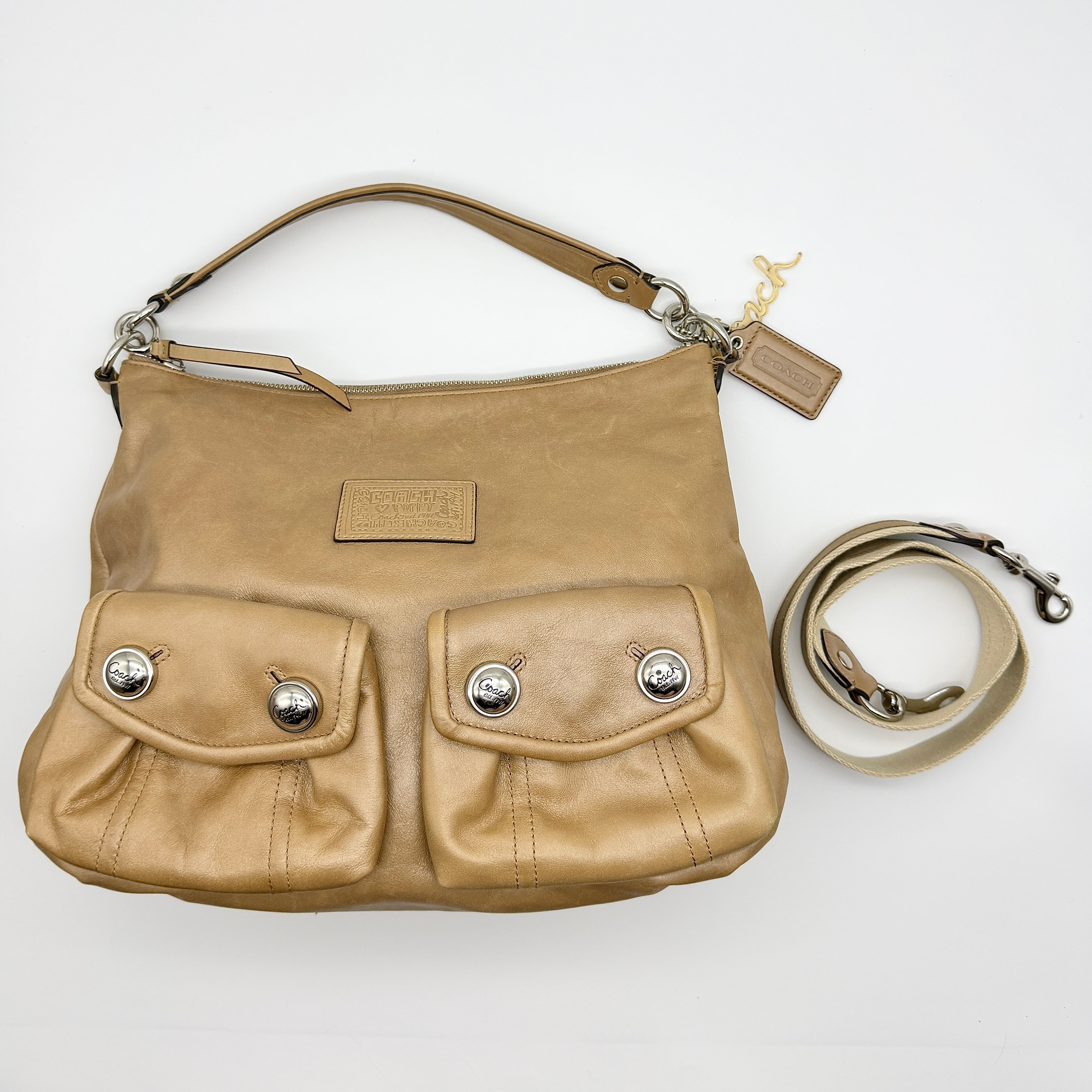 Coach 2Way Signature Poppy Preloved Luxury Shoulder Bag in beige leather with silver hardware and multicolor striped lining.