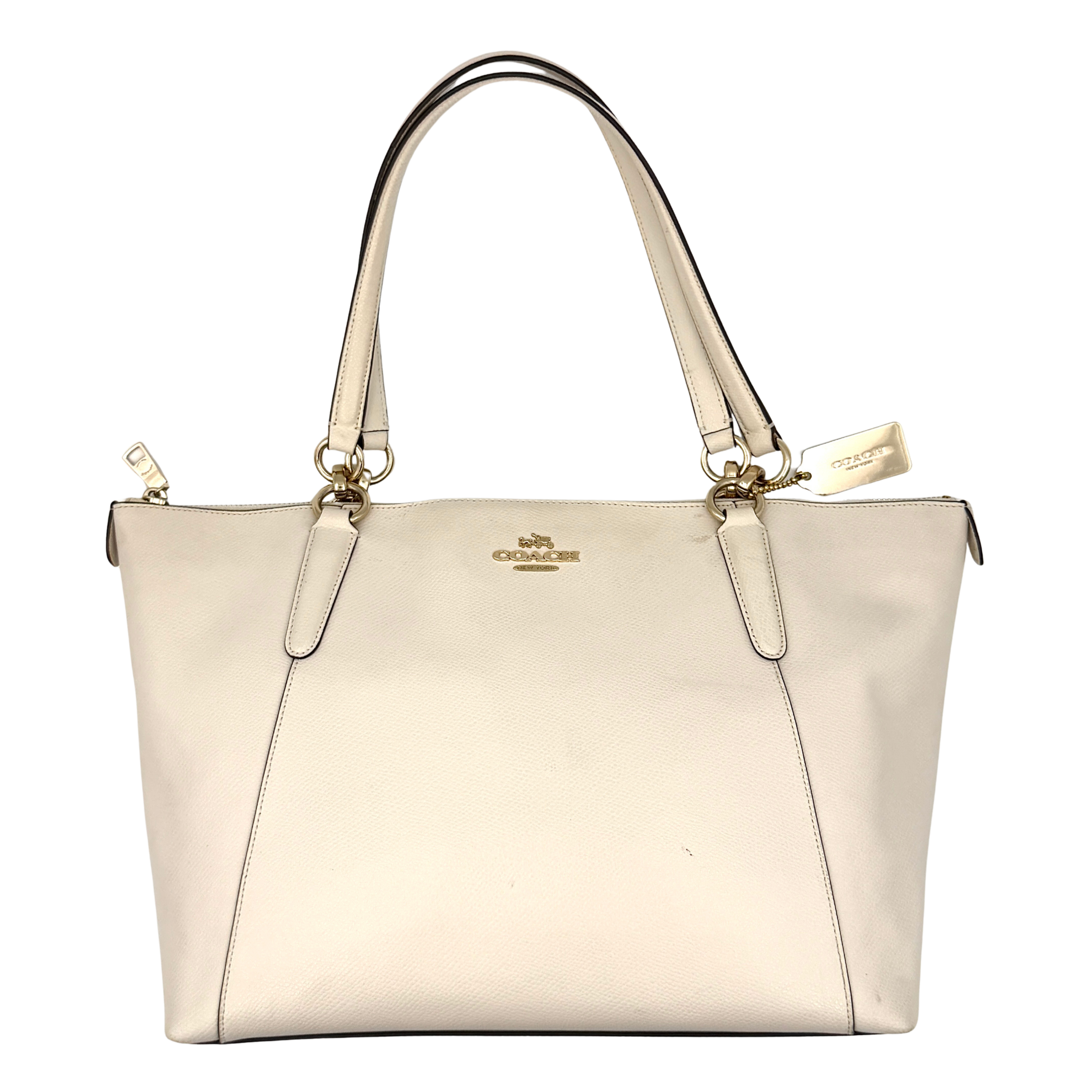 Coach Ava leather tote bag in cream with gold-tone logo and top zip closure, shown from front, side, and close-up hardware angles.