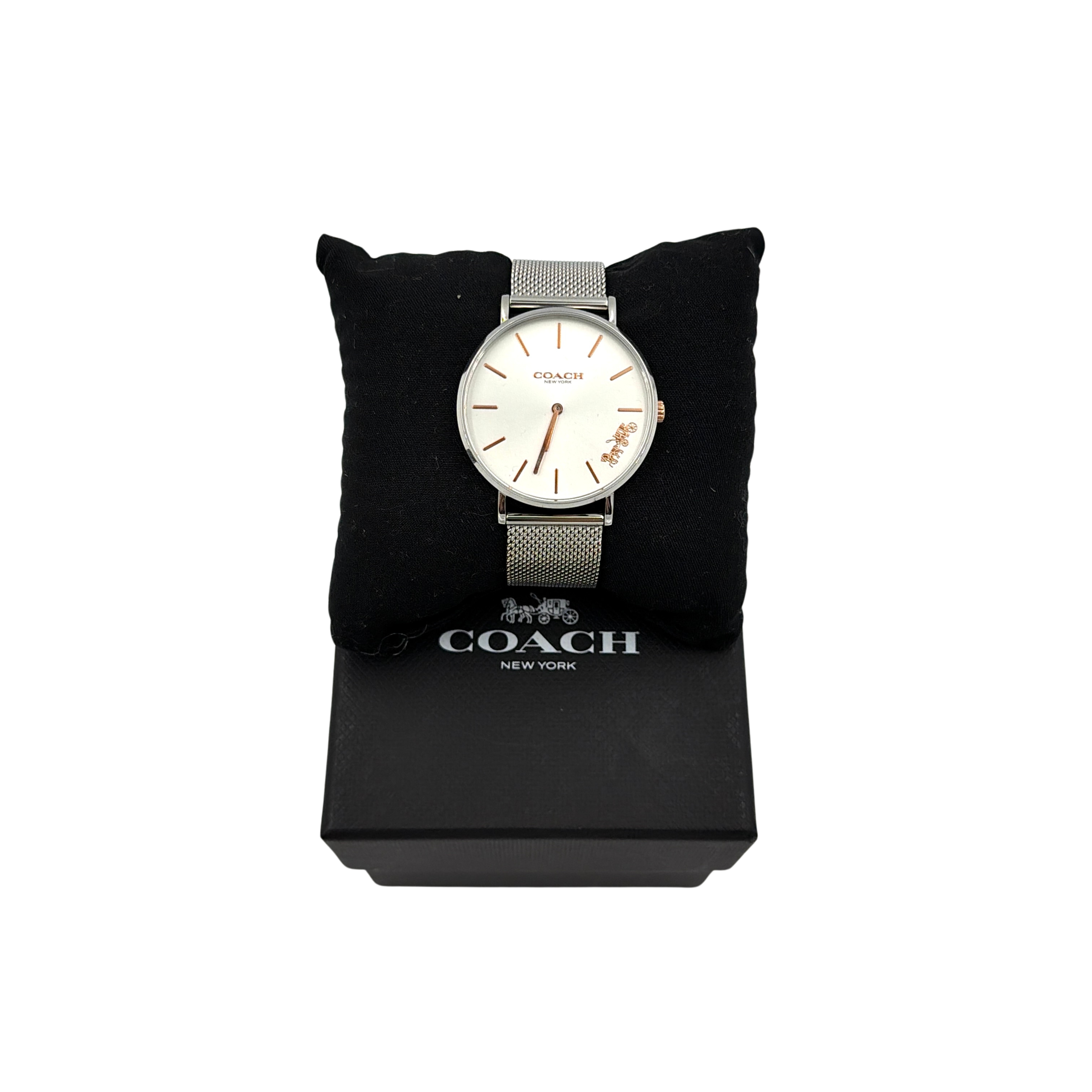Coach Perry stainless steel mesh watch with silver dial, shown with box and multiple angles.