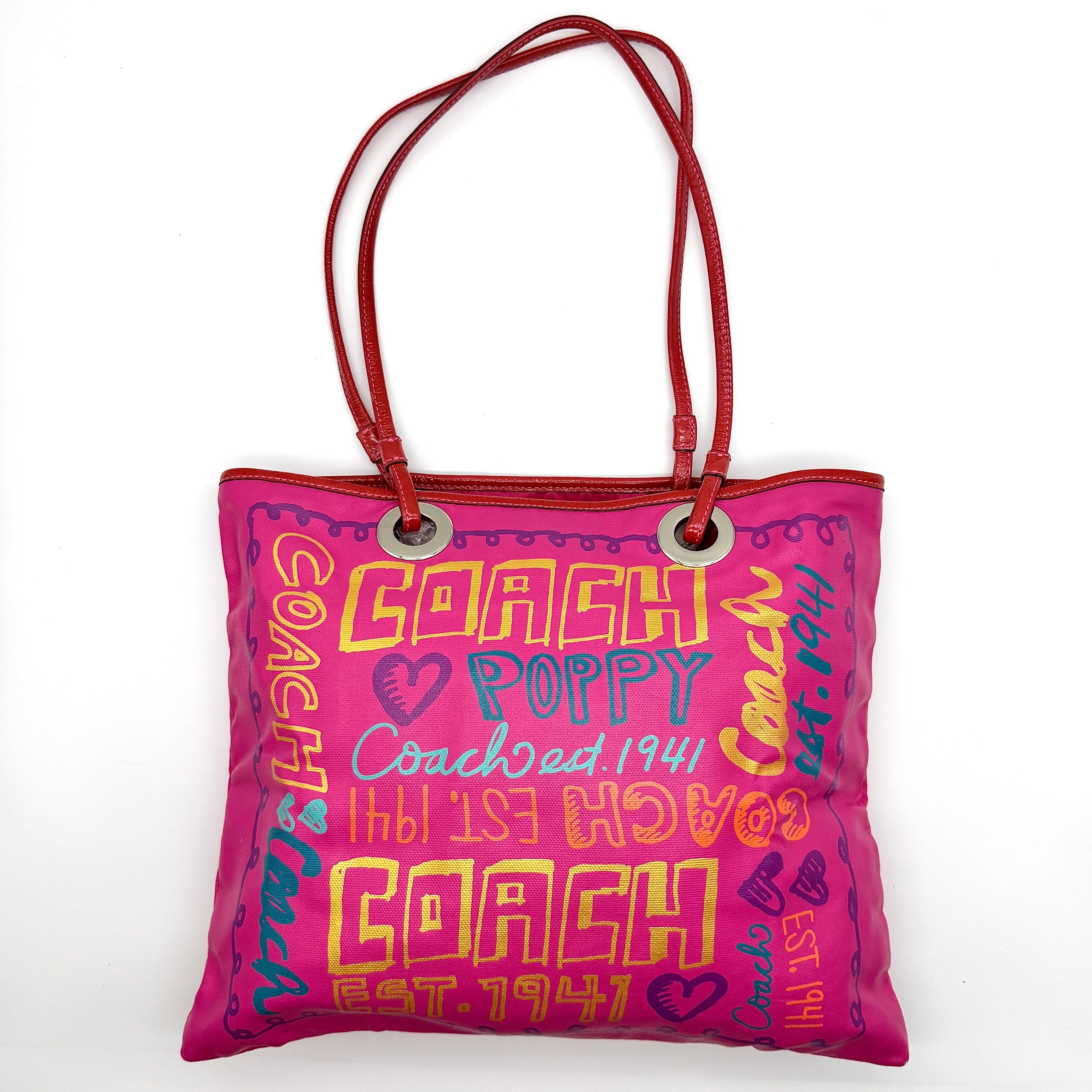 Coach Poppy Graffiti Glam Preloved Luxury Tote Bag in pink canvas with multicolor graffiti print and red patent handles.