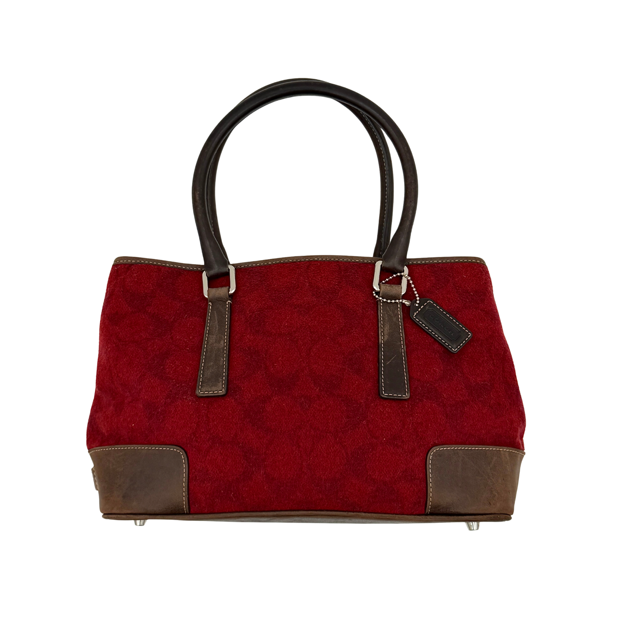 Coach signature canvas wool shoulder bag in red with brown leather trim, structured silhouette, top handles, and protective metal base feet.