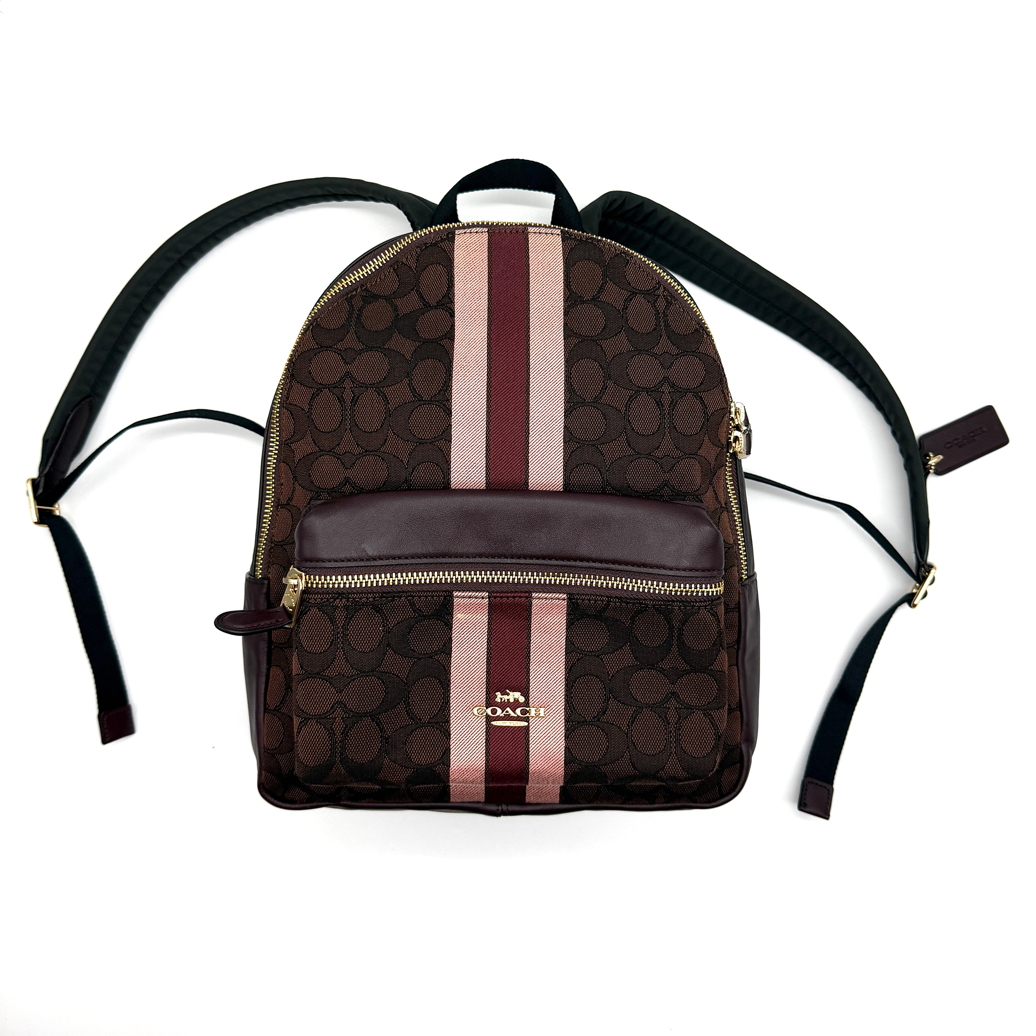 Coach Signature Charlie Stripe Backpack Brown/Pink, crafted in coated canvas with pink stripe detail and leather trim.