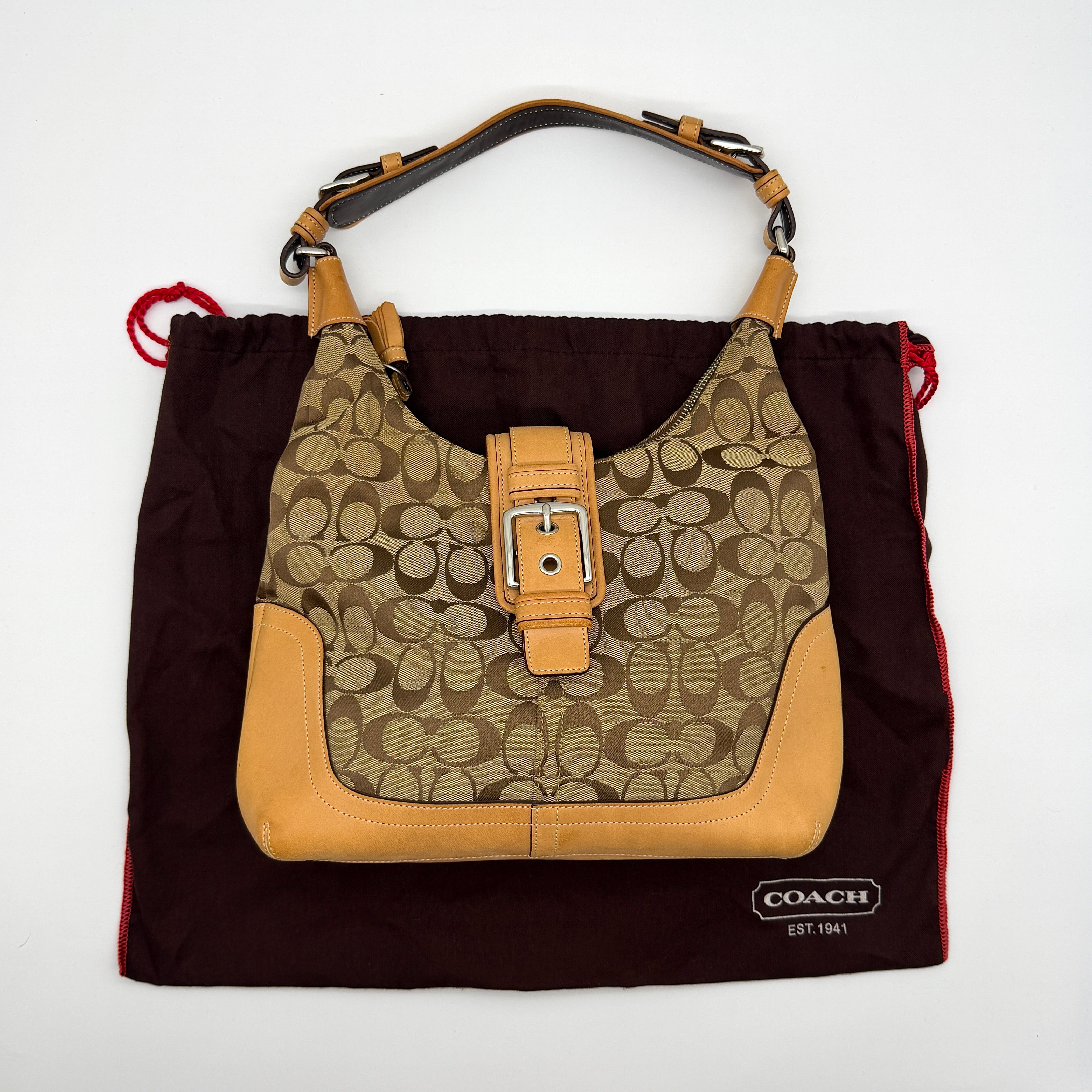Coach Signature Clip Hamilton Hobo Shoulder Bag in beige jacquard canvas with tan leather trim, buckle accent, and original dust bag.