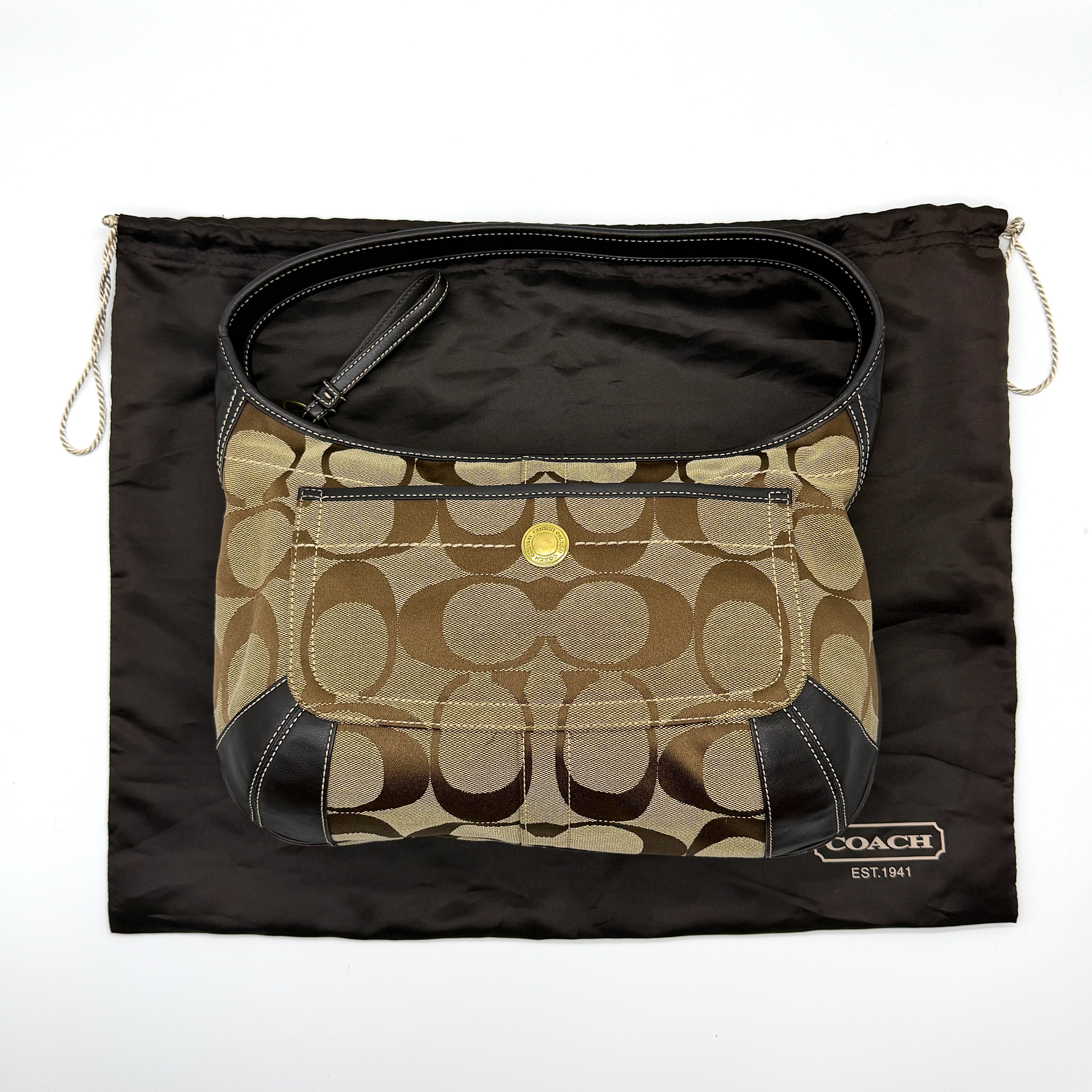 Coach Signature Ergo Shoulder Bag in beige and brown jacquard canvas with black leather trim and gold-tone hardware.