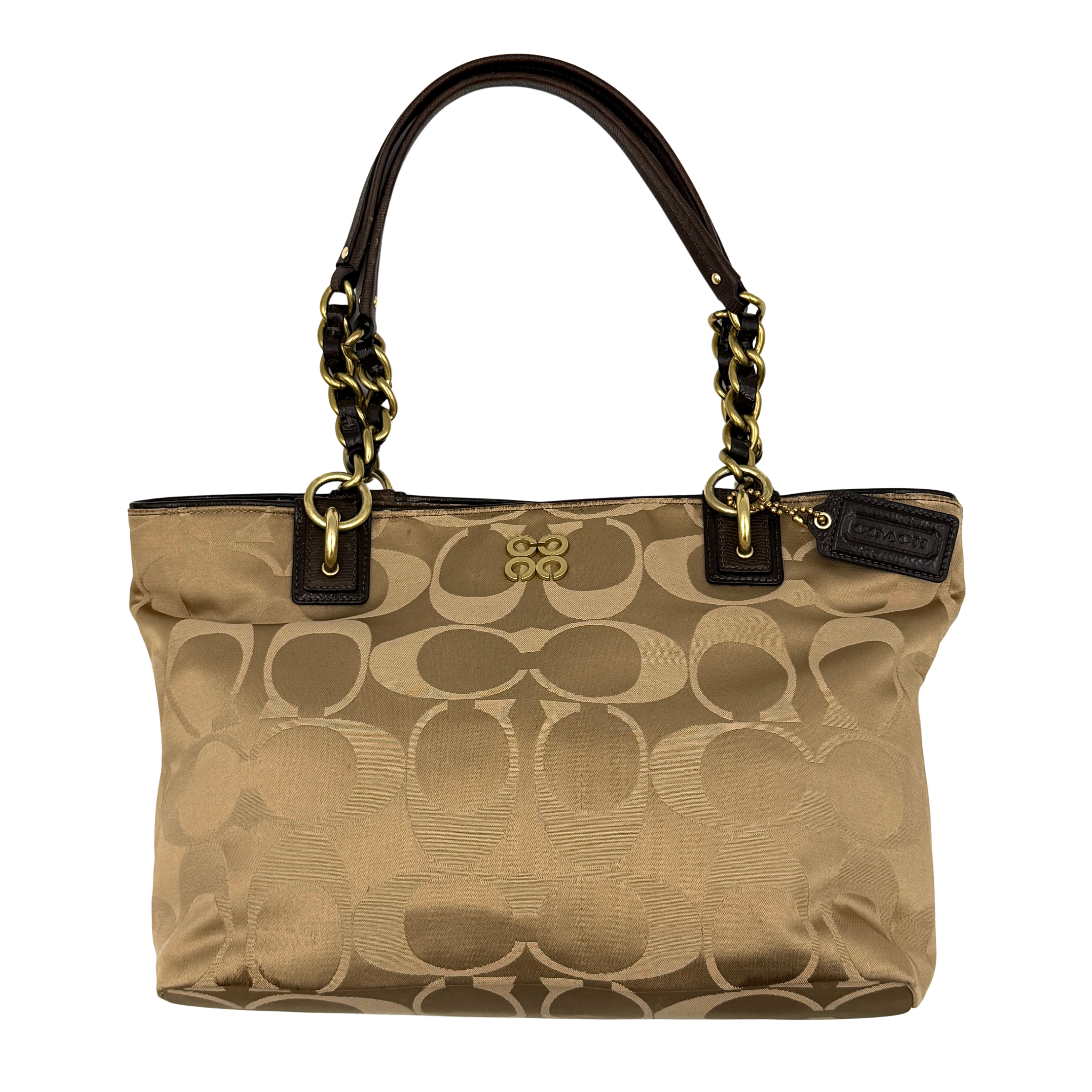 Coach Madison Op Art tote bag in beige and brown signature jacquard with leather trim and chain-detail shoulder straps, shown from front and side angles.
