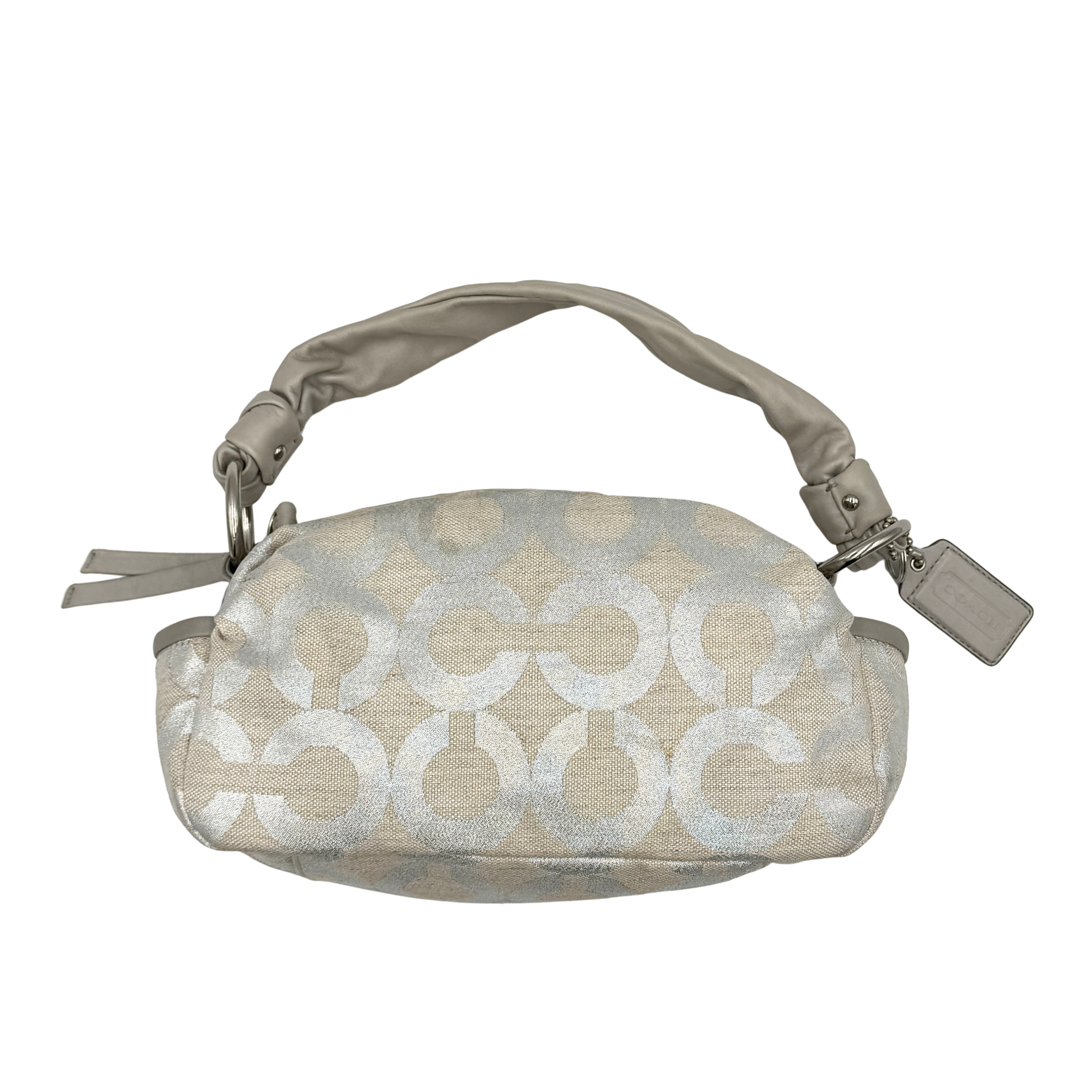 Coach Signature Parker Op Art Shoulder Bag in metallic silver with iconic pattern, featuring a shoulder strap and sleek design.