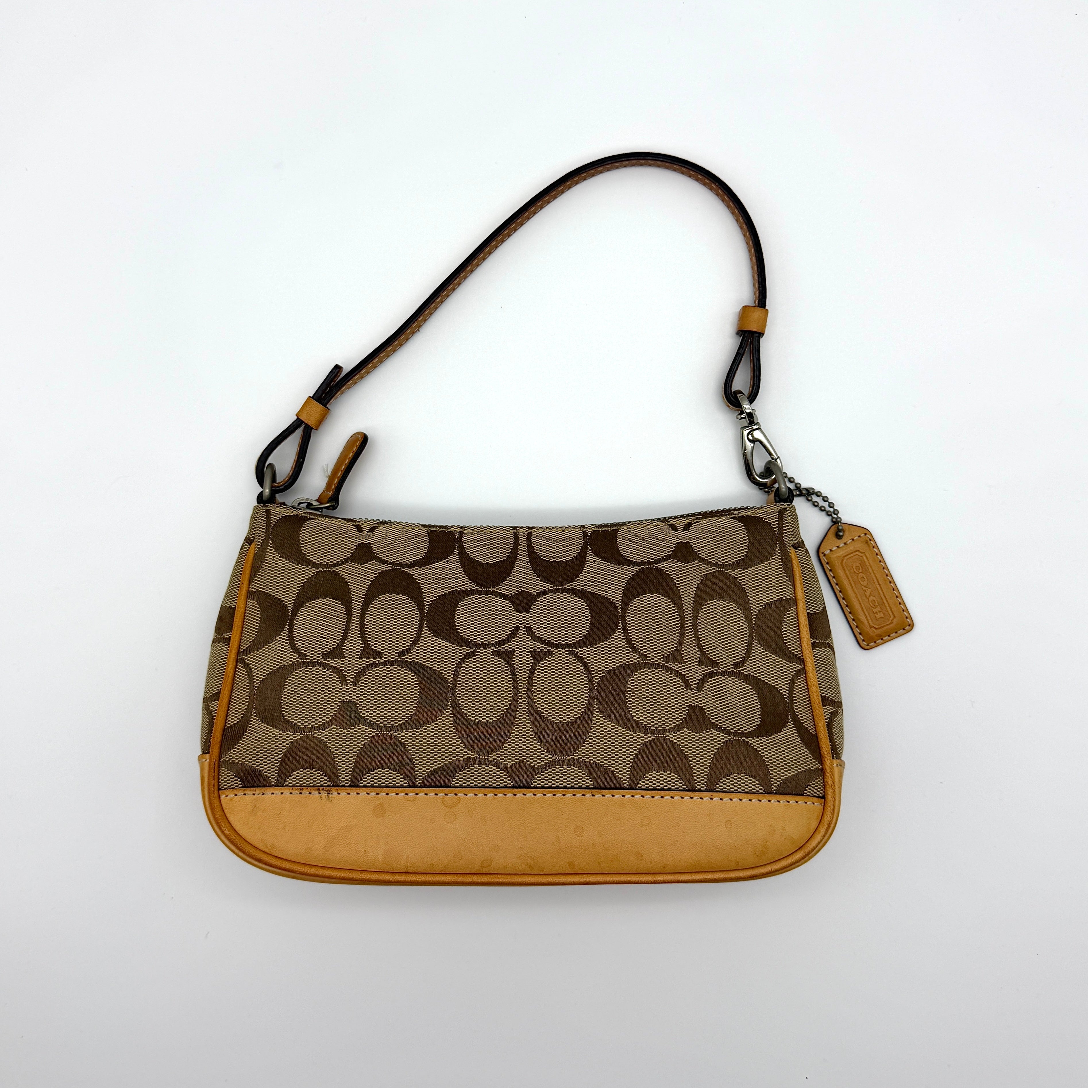 Coach Y2K Demi Shoulder Bag in tan signature canvas with leather trim and red interior lining.