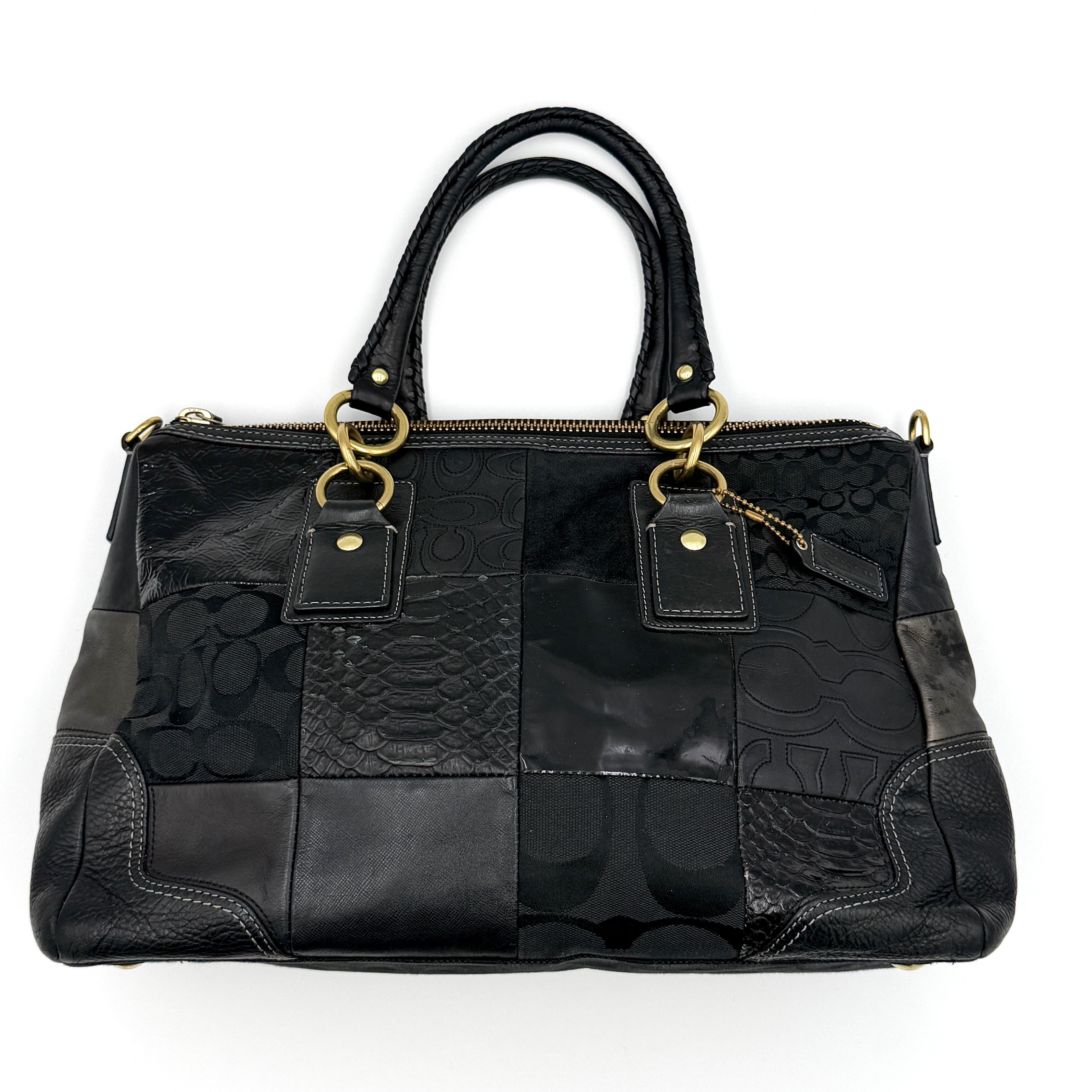 Coach Y2K Hampton shoulder bag in black featuring signature patchwork design, mixed textured panels, and dual top handles
