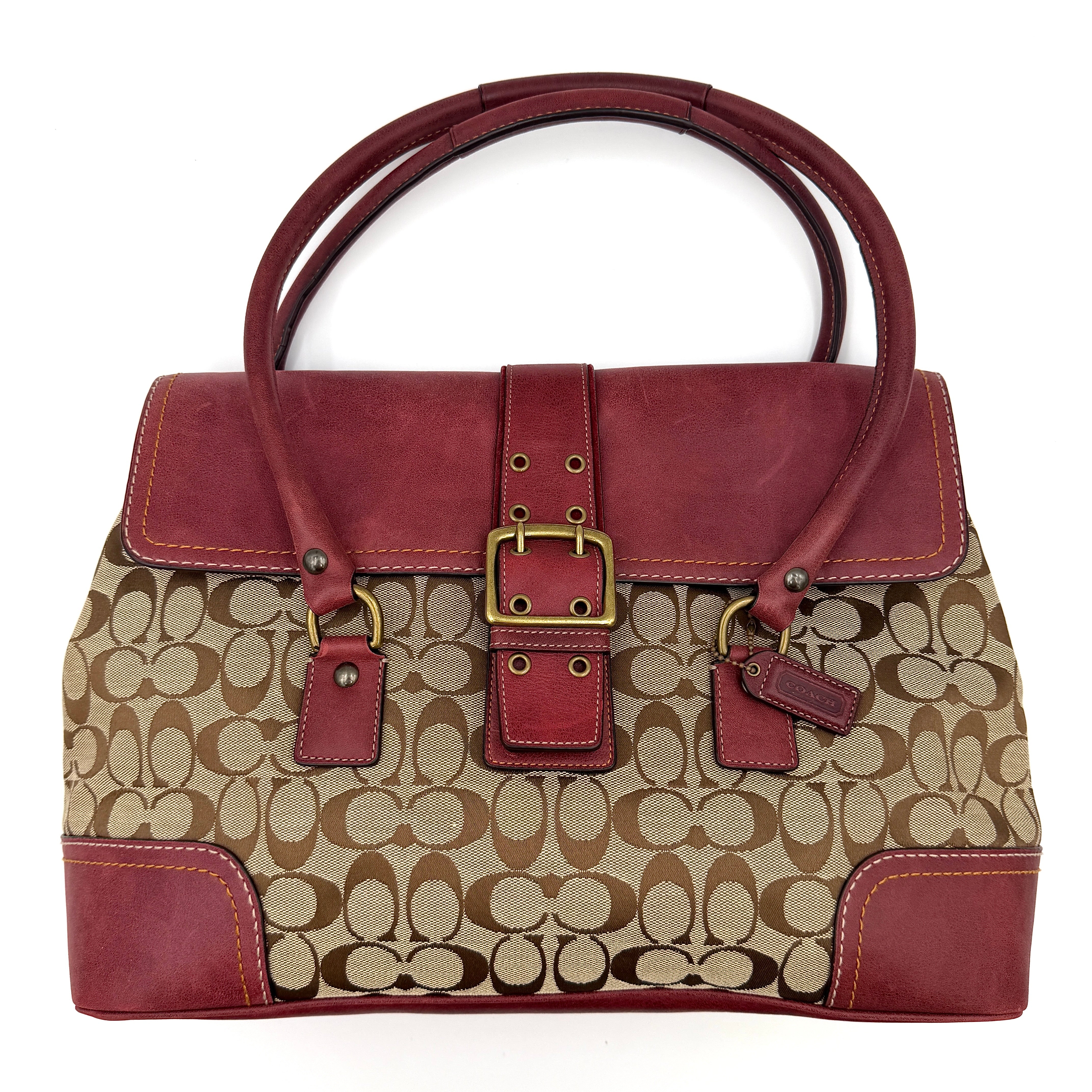Coach Y2K Signature Soho Flap Shoulder Bag in burgundy and beige with monogram pattern and buckle accents