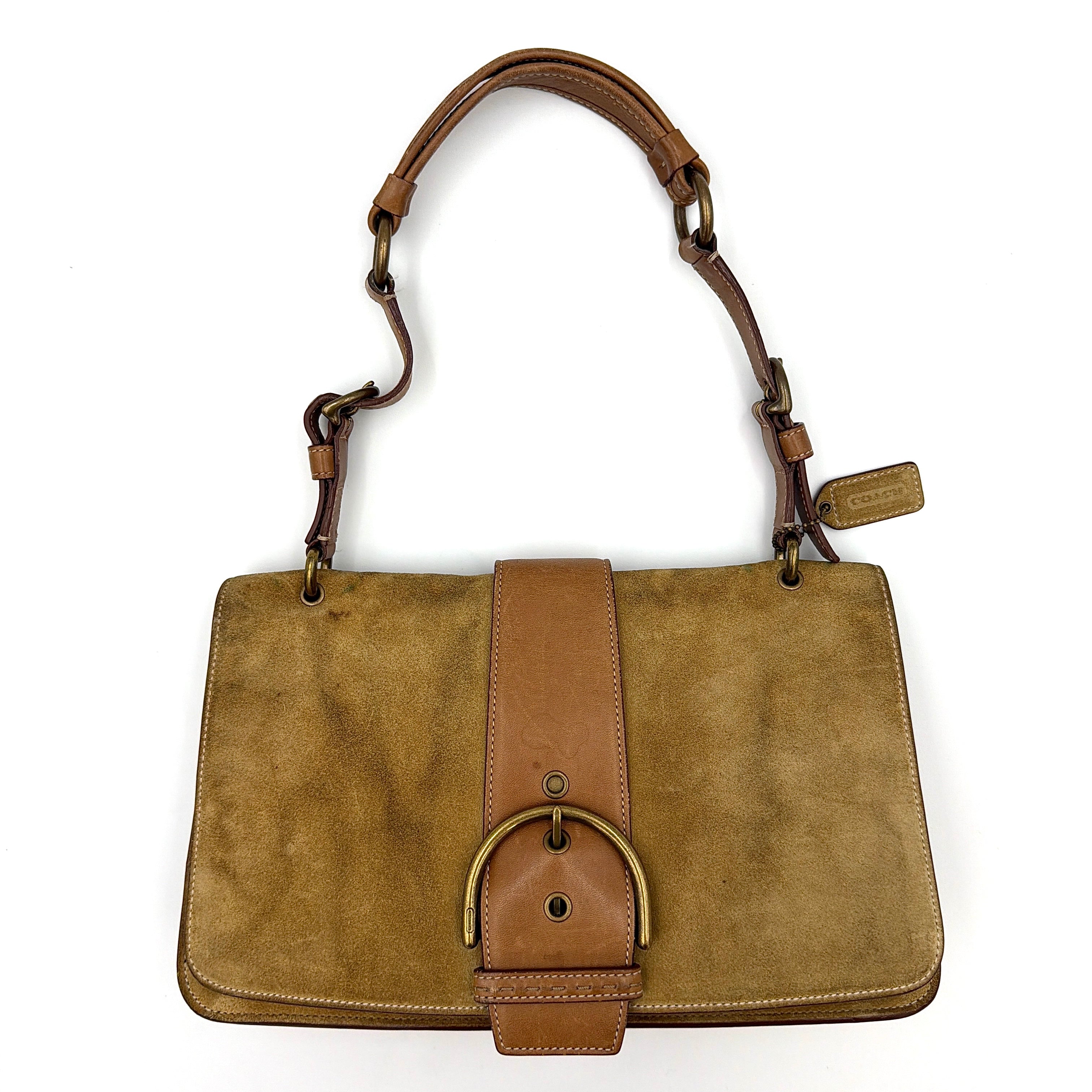 Coach Y2K Soho Buckle Suede Shoulder Bag in tan with a sleek suede finish, featuring a prominent buckle and comfortable shoulder strap.