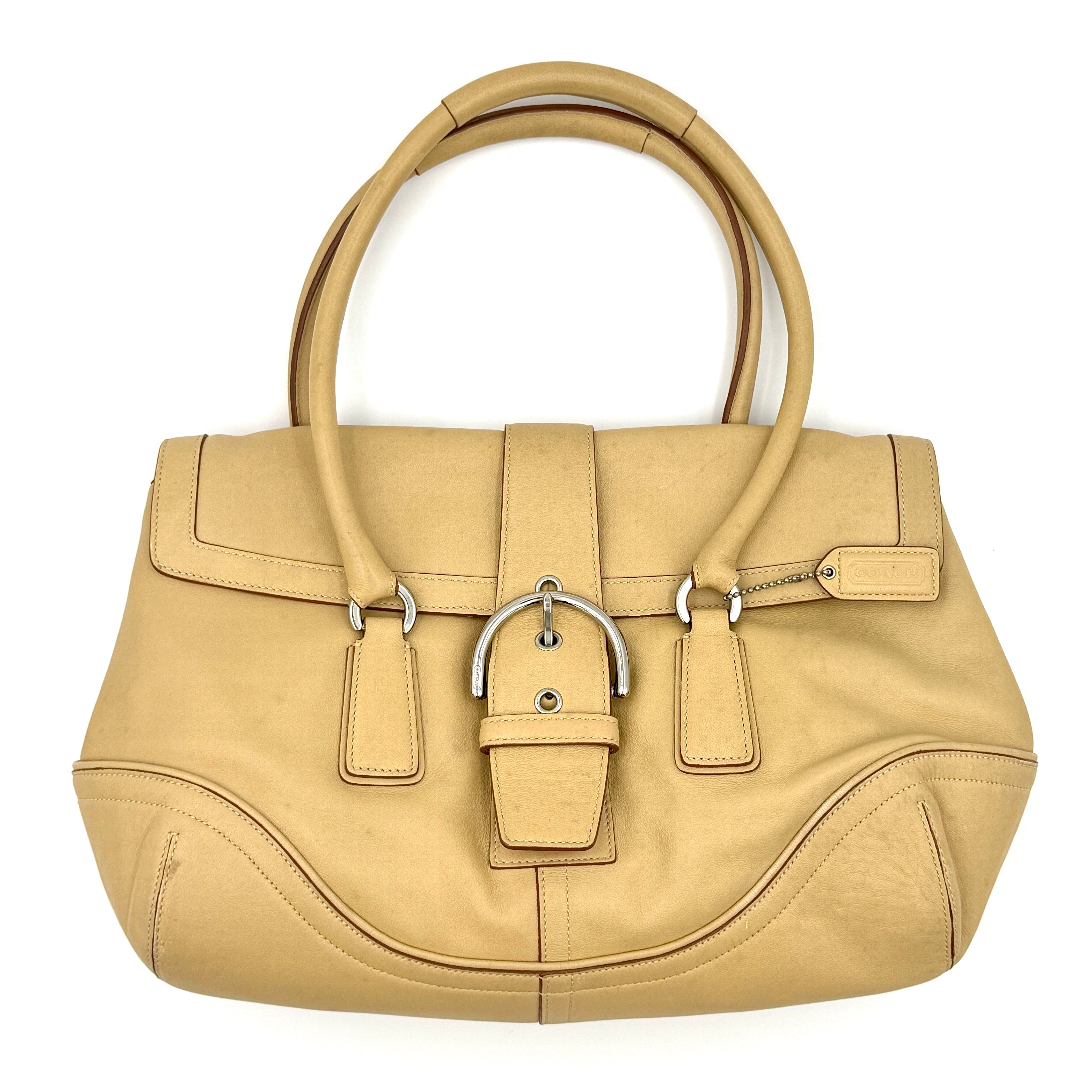Coach Y2K Soho Shoulder Bag in light tan smooth leather with silver-tone buckle detail, pre-loved luxury.