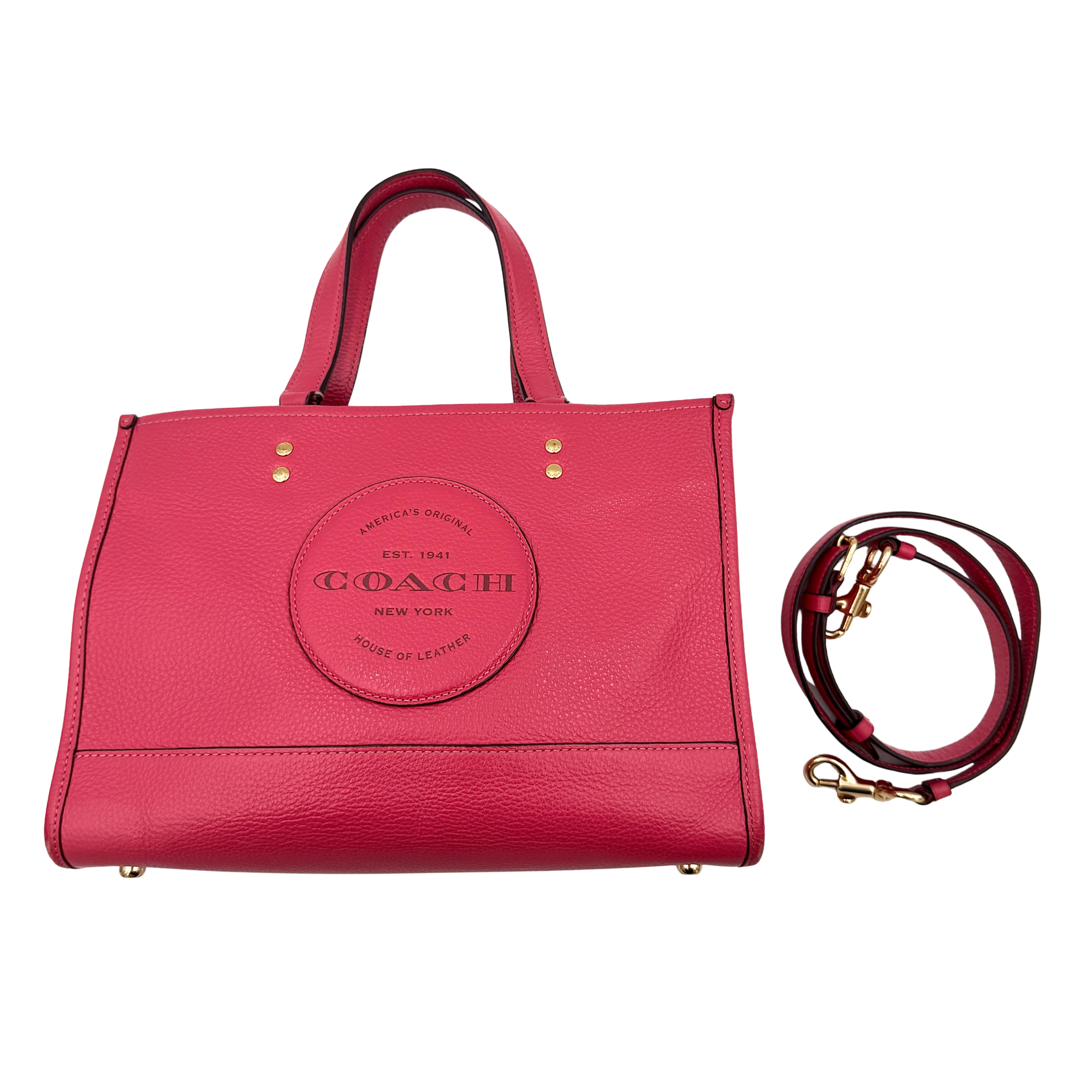 Coach pink Dempsey carryall tote bag with dual handles, gold-tone hardware, and adjustable strap