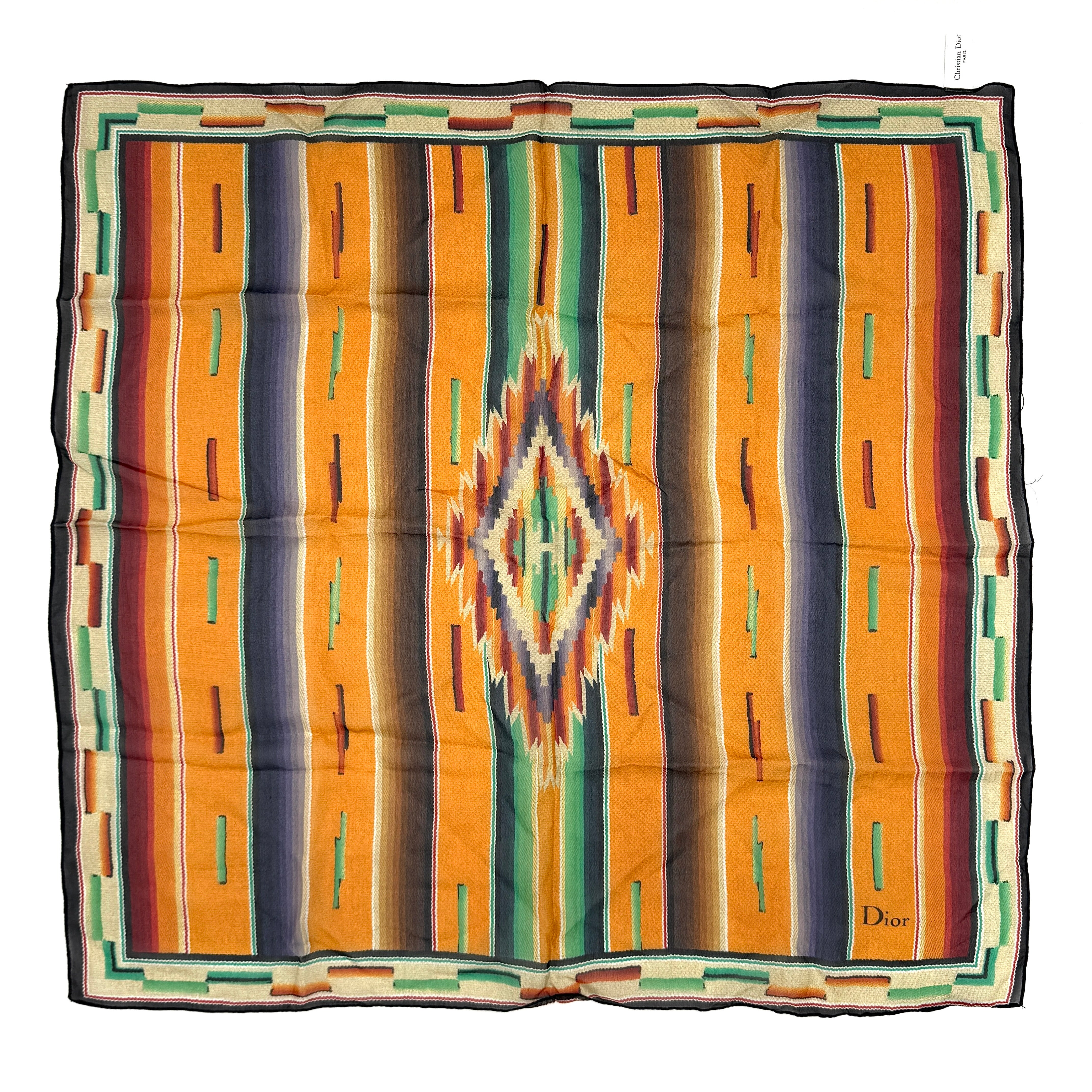 Dior Aztec silk scarf featuring a vibrant multicolor geometric design, showcasing elegance and versatility.
