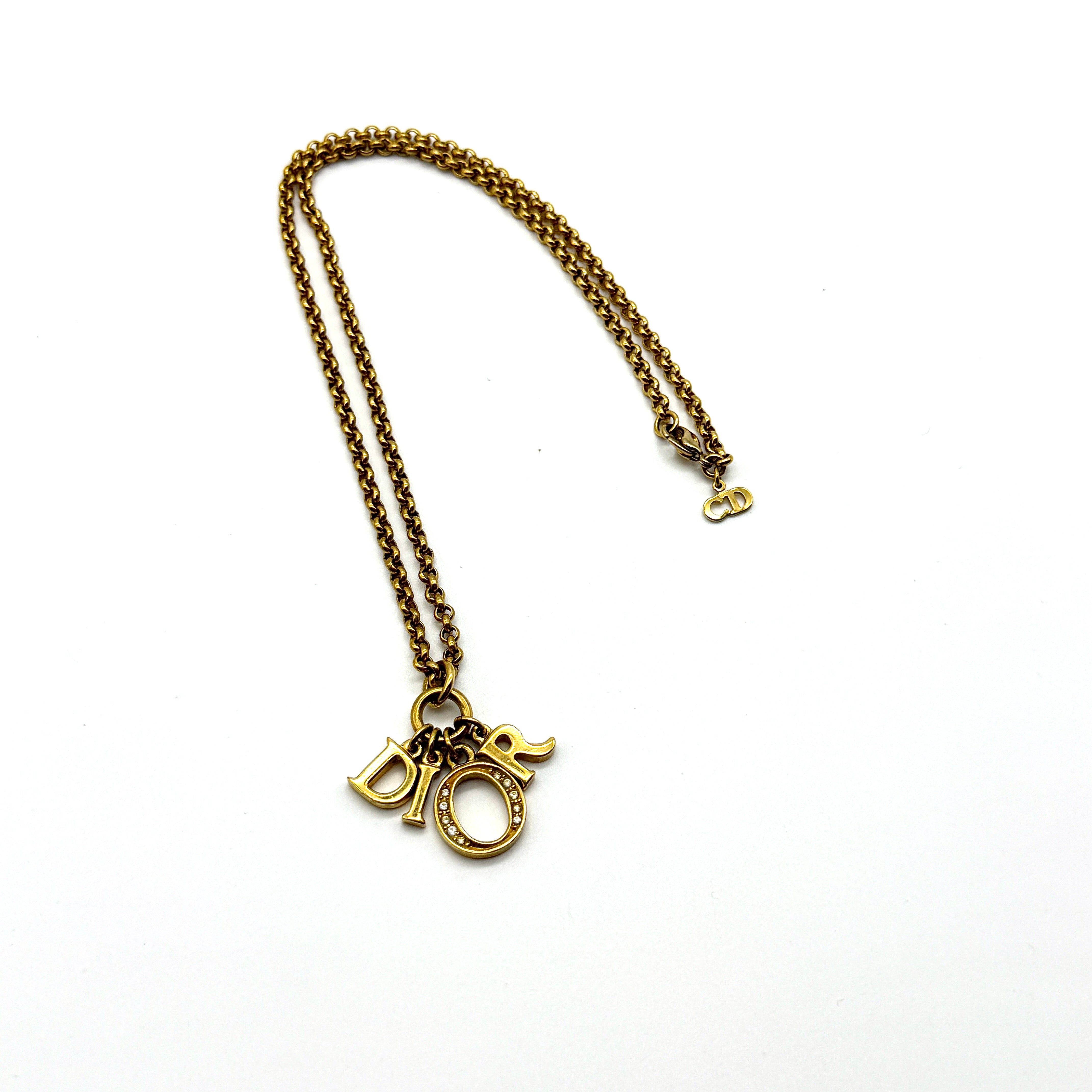 Dior Letter Rhinestone Preloved Luxury Necklace in gold-tone metal with crystal accents and CD charm clasp.