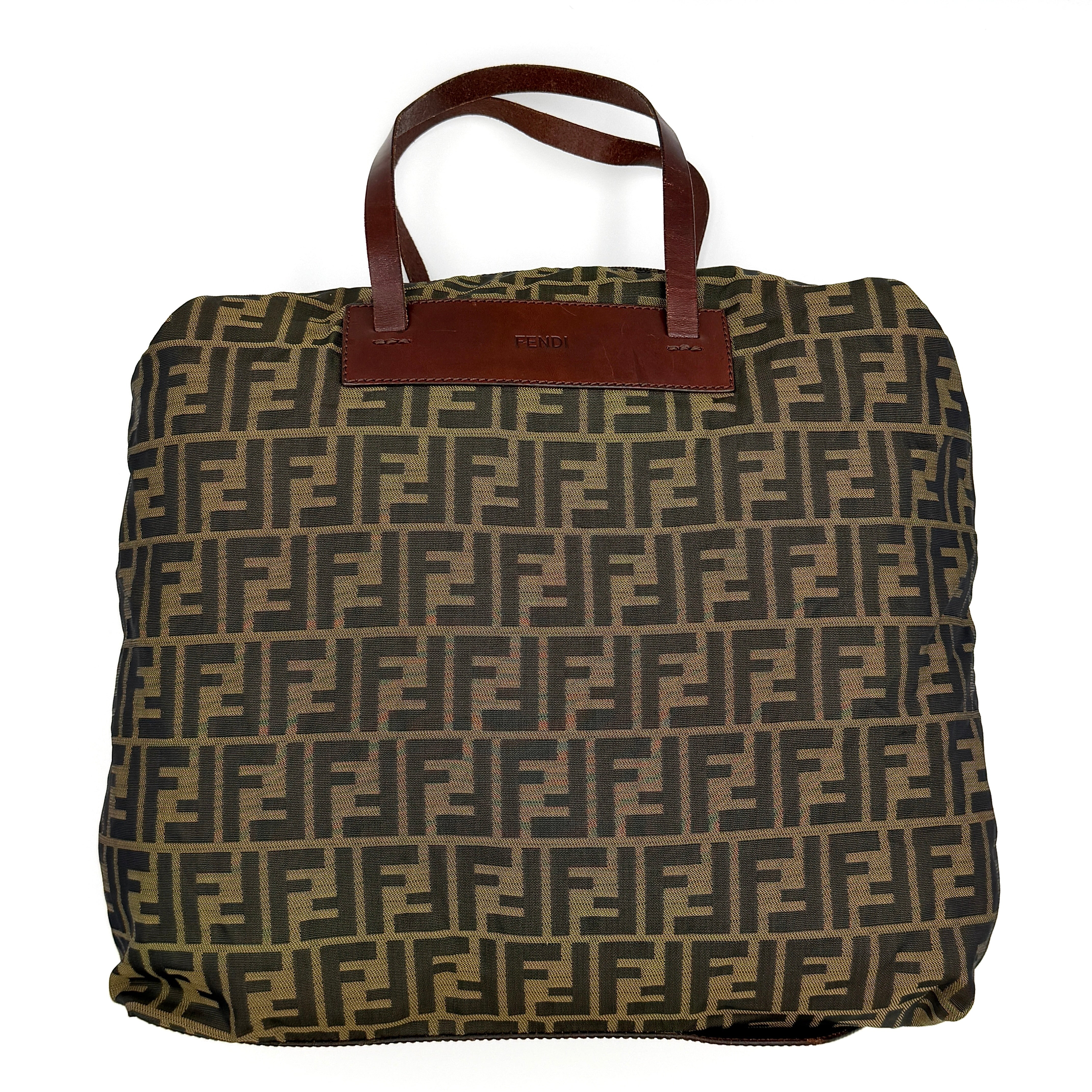 Fendi FF Zucca Tote Bag Brown, crafted from monogram canvas with brown leather handles and base.
