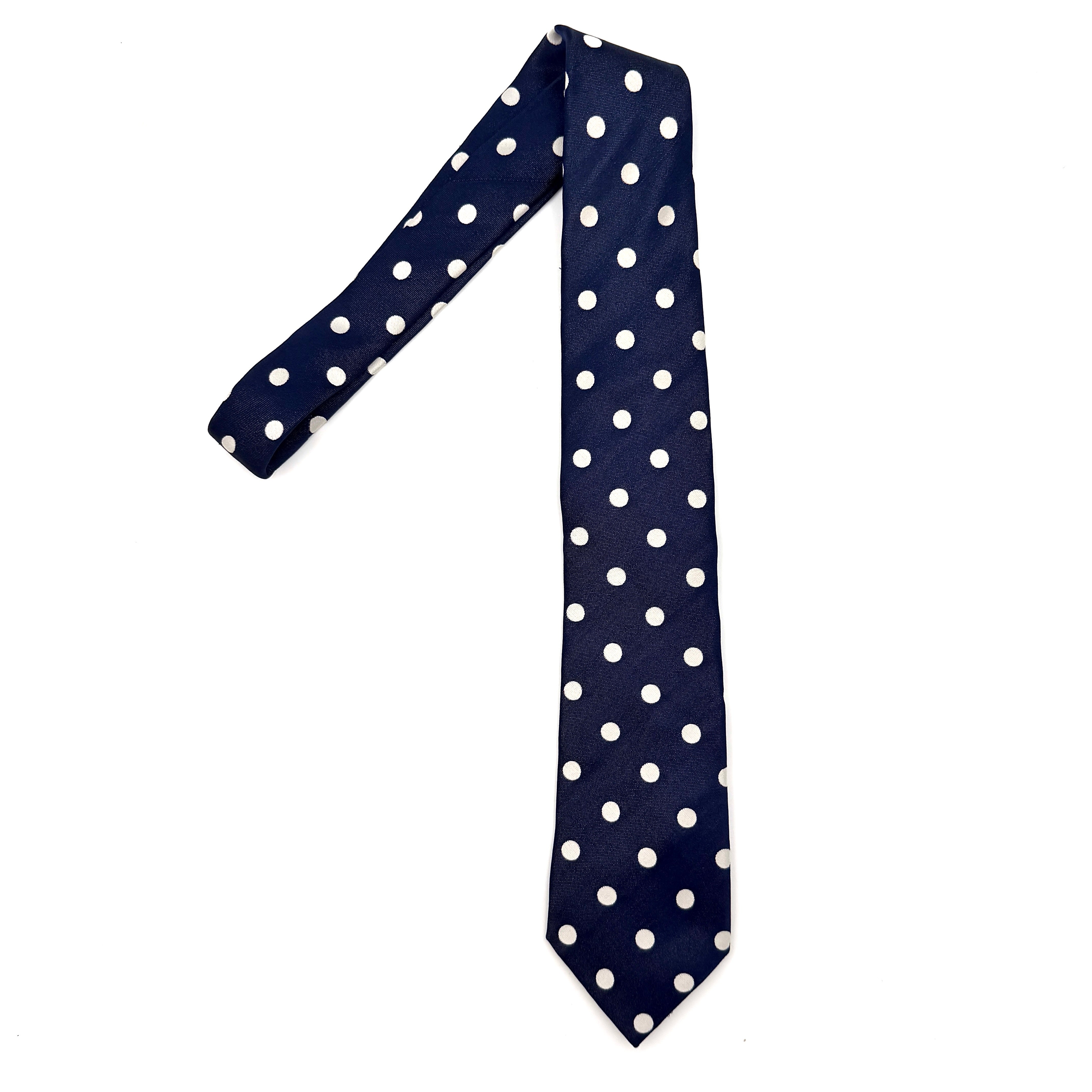 Fendi polka dot silk tie in blue with white dot pattern displayed fully laid out on a white background