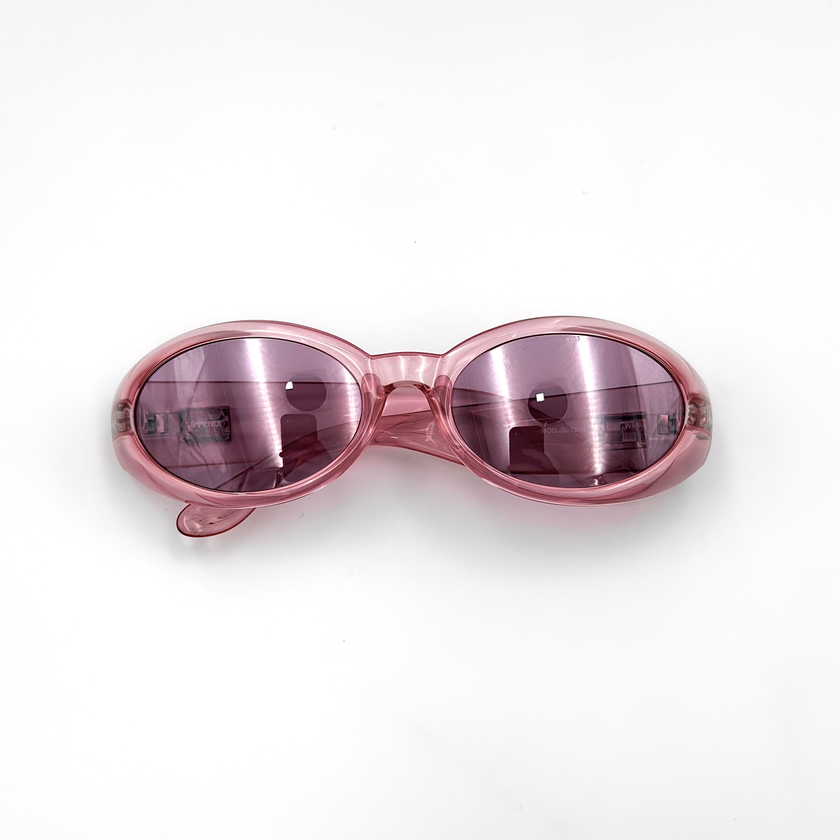 Fendi SL7566 Oval Sunglasses in translucent pink acetate with pink tinted lenses and FF logo temples.