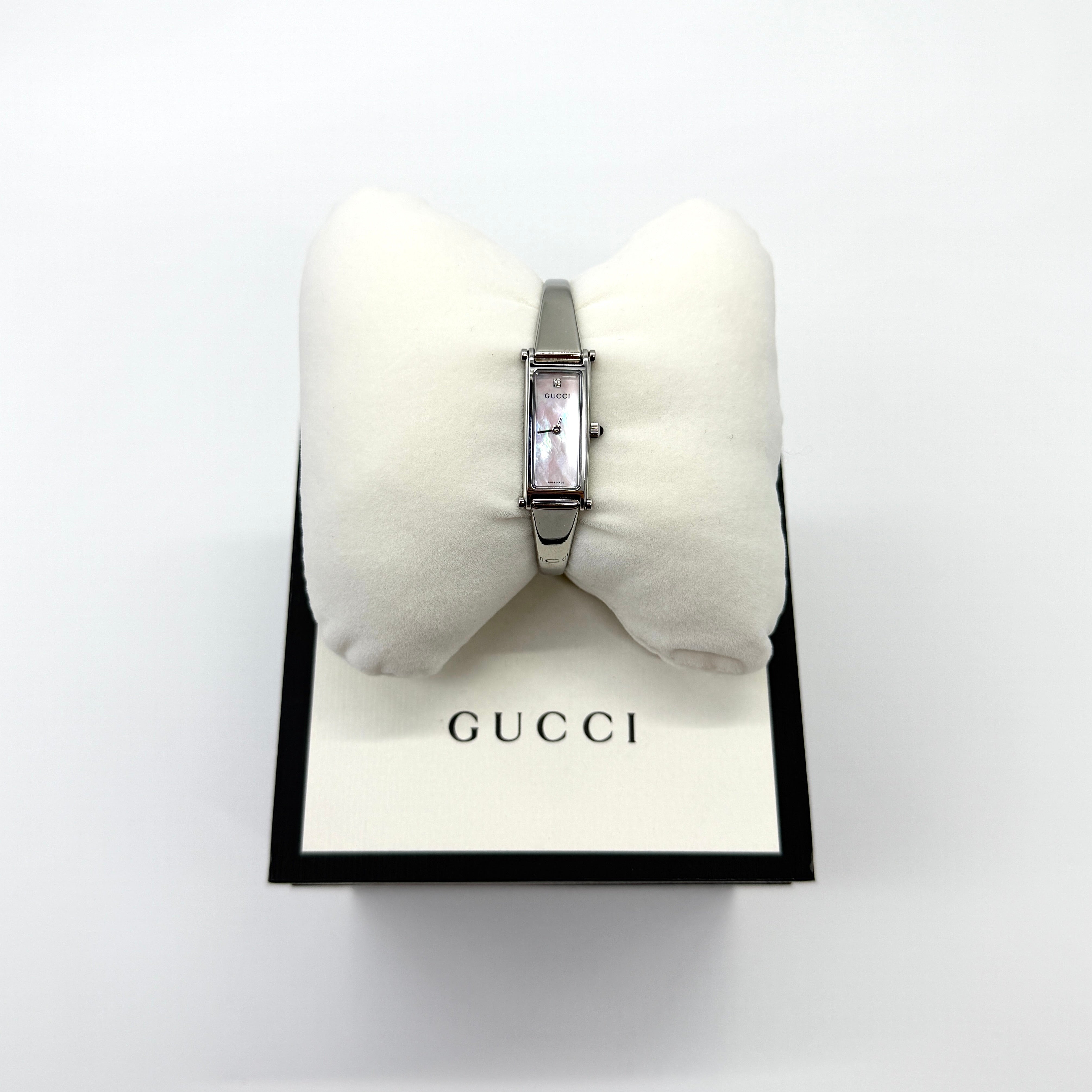 Gucci 1500L Mother of Pearl Dial Watch, silver-tone stainless steel bracelet with rectangular mother-of-pearl dial and Gucci box.