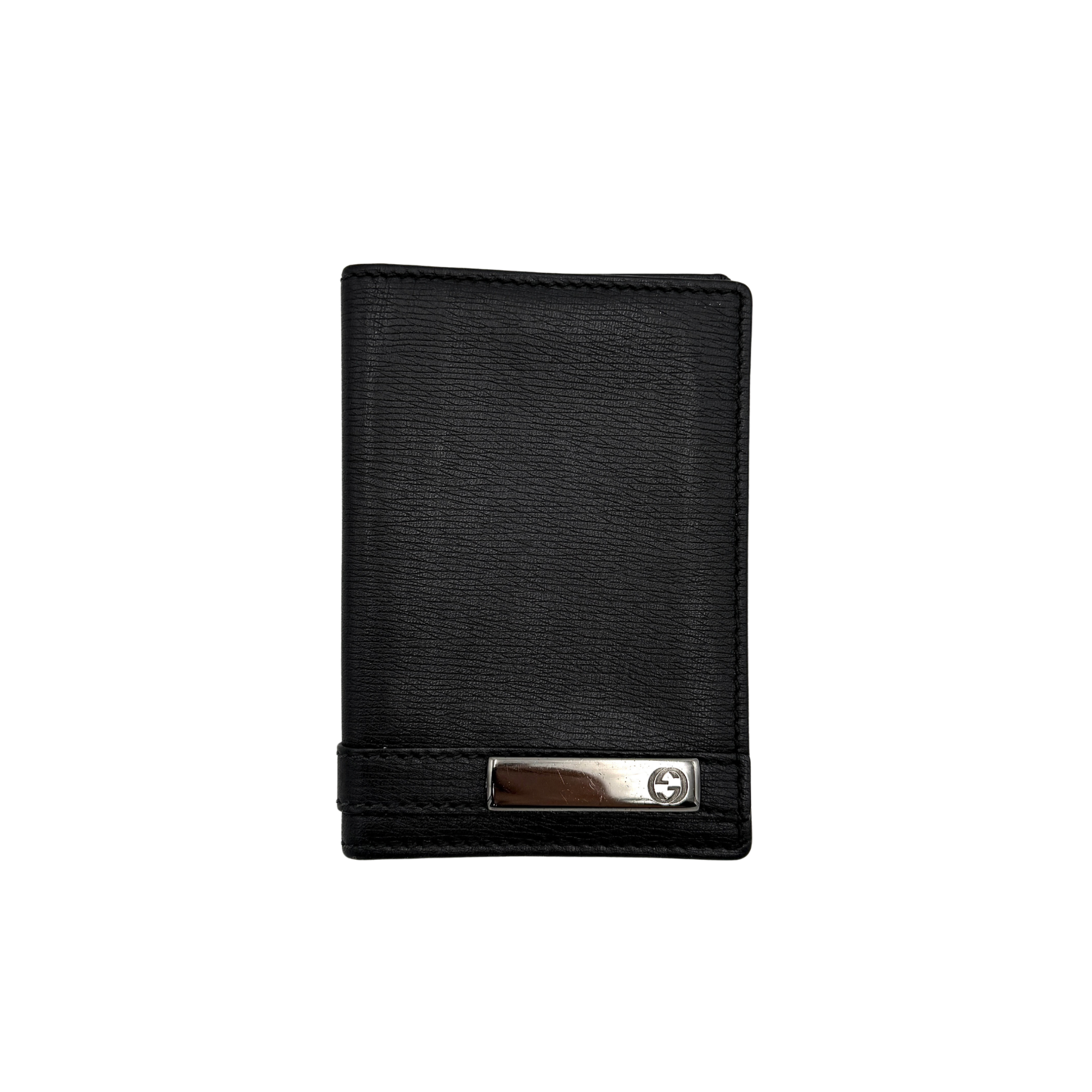 Gucci GG Bifold Cardholder in black with a textured exterior and metal logo detail at the front, showing a compact interior for card organization