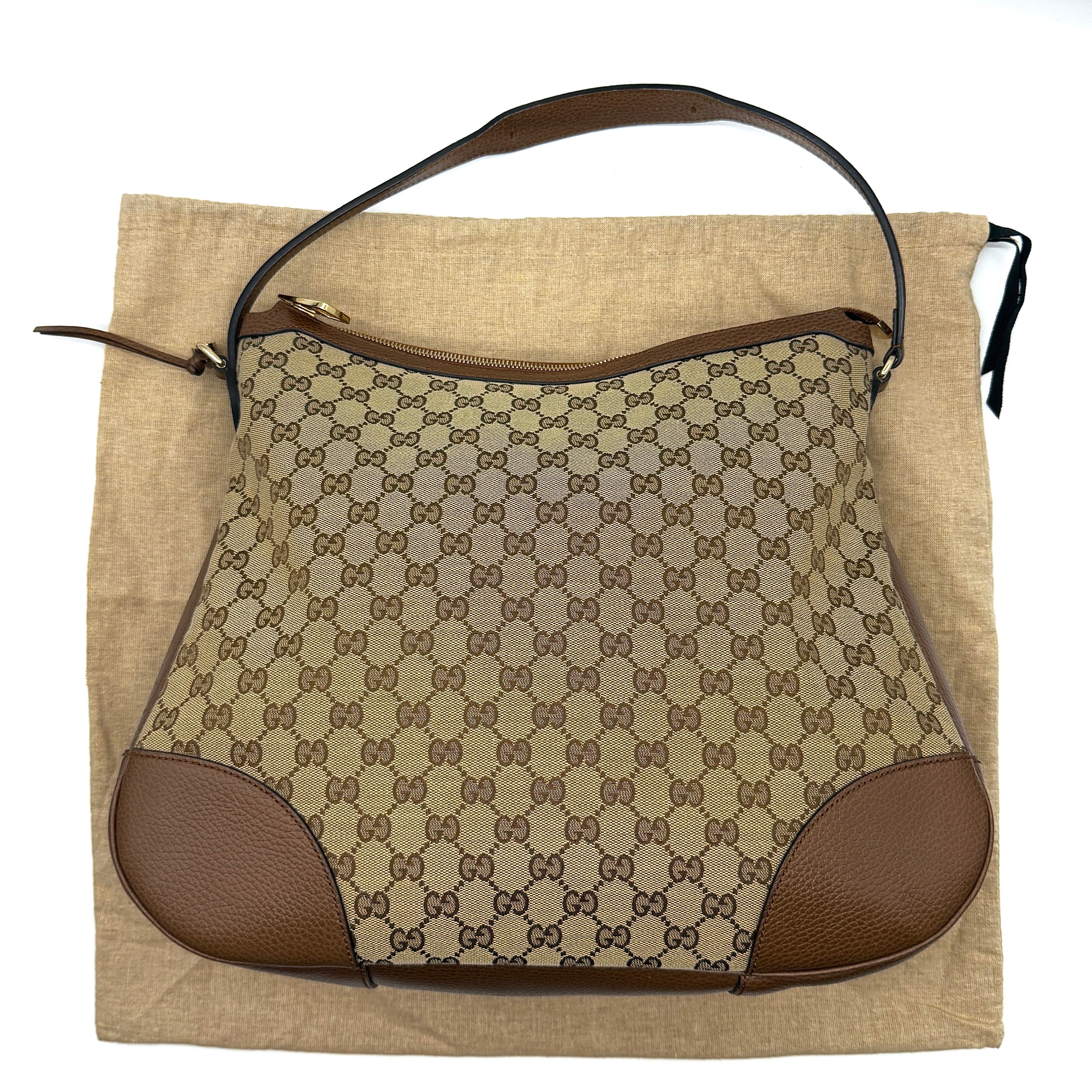 Gucci GG Monogram Bree Hobo Shoulder Bag Brown, crafted from monogram canvas with brown leather trim and gold-tone hardware.